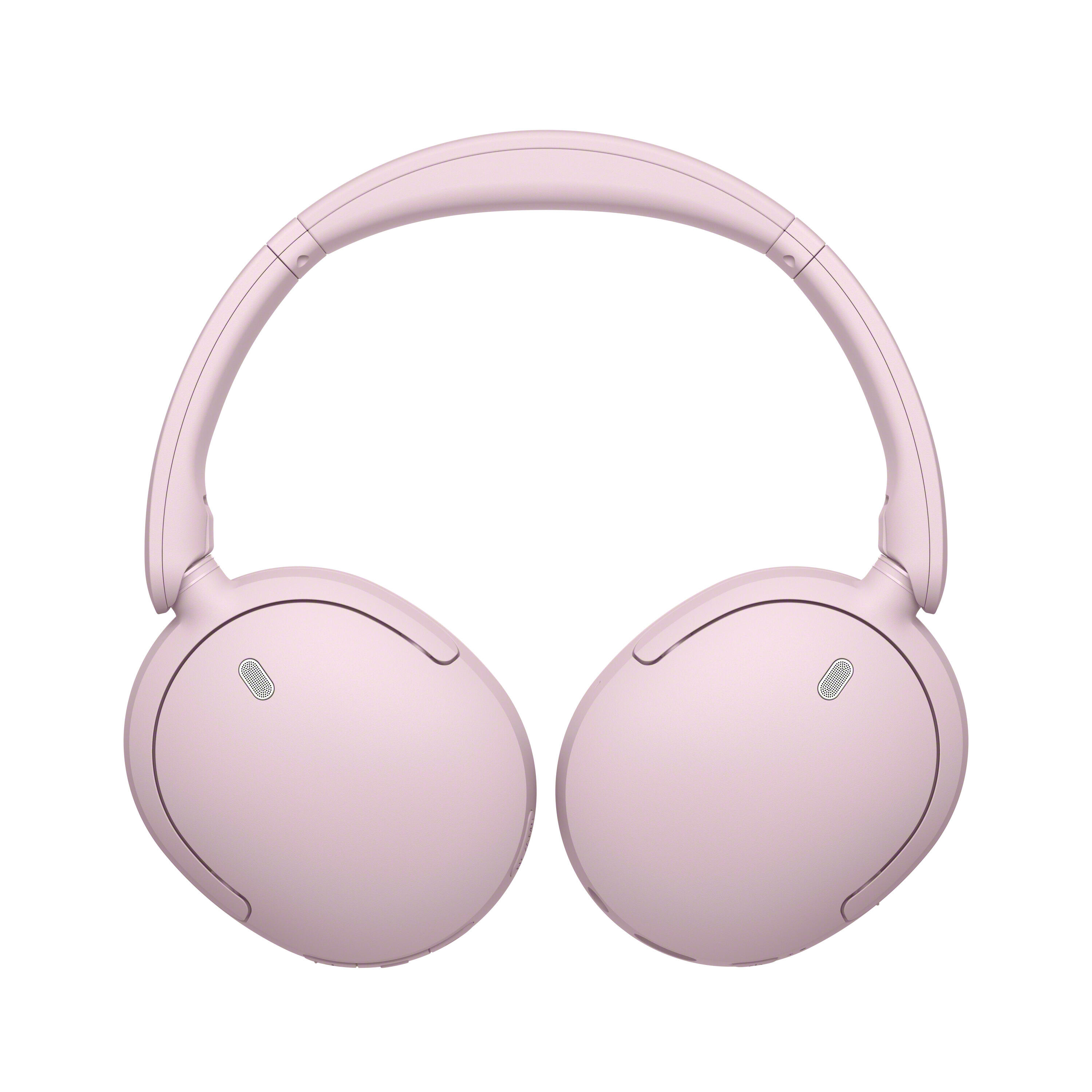 Auriculares inalambricos supraurales rosas sobre fondo blanco.