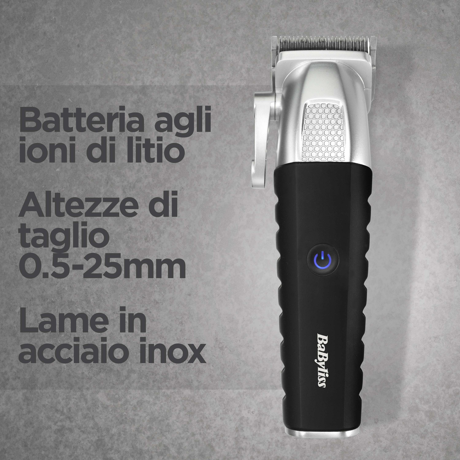 Un tagliacapelli BaByliss argento e nero su sfondo grigio con testo in italiano.