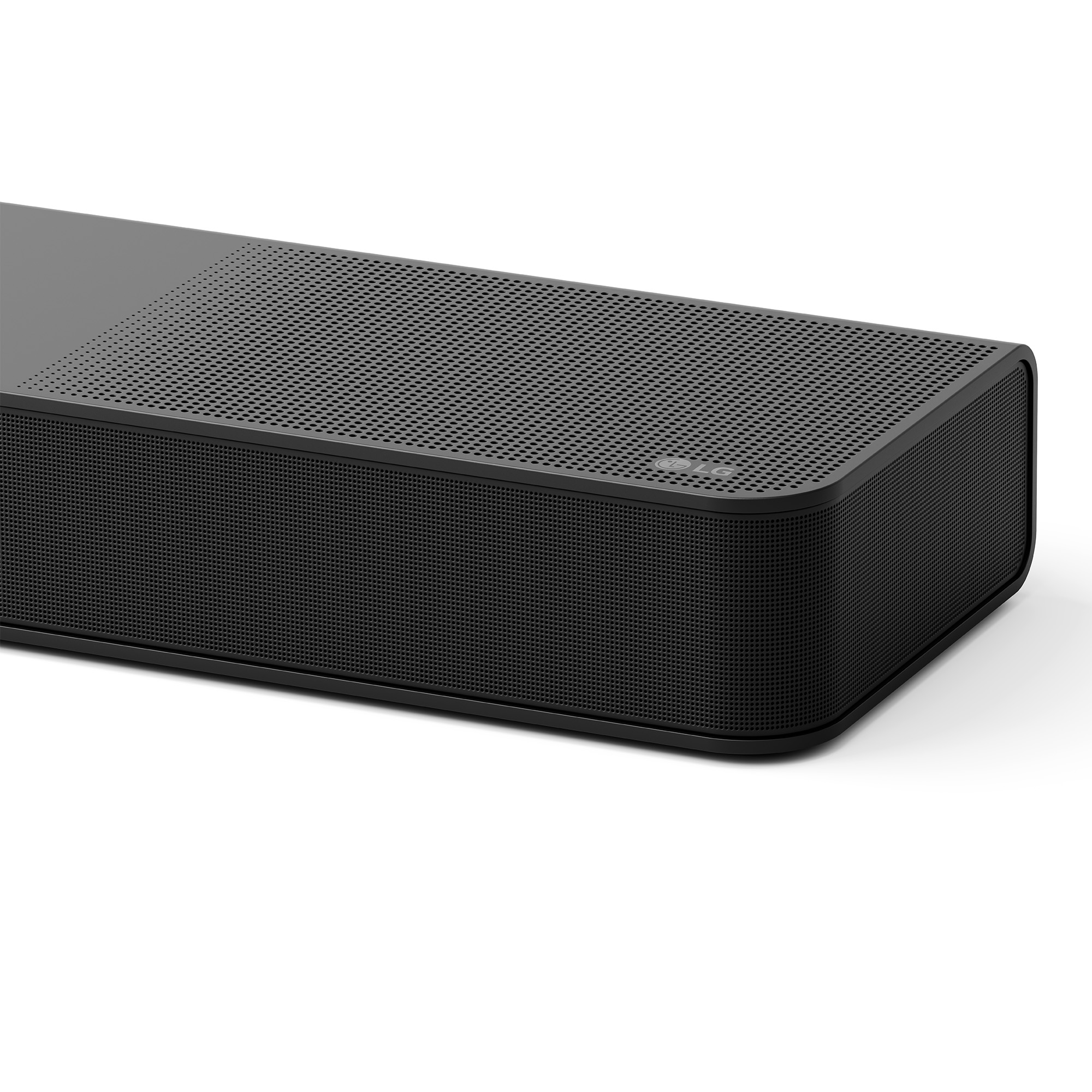 Barra de sonido LG negra con rejilla metálica y diseño moderno sobre fondo blanco.
