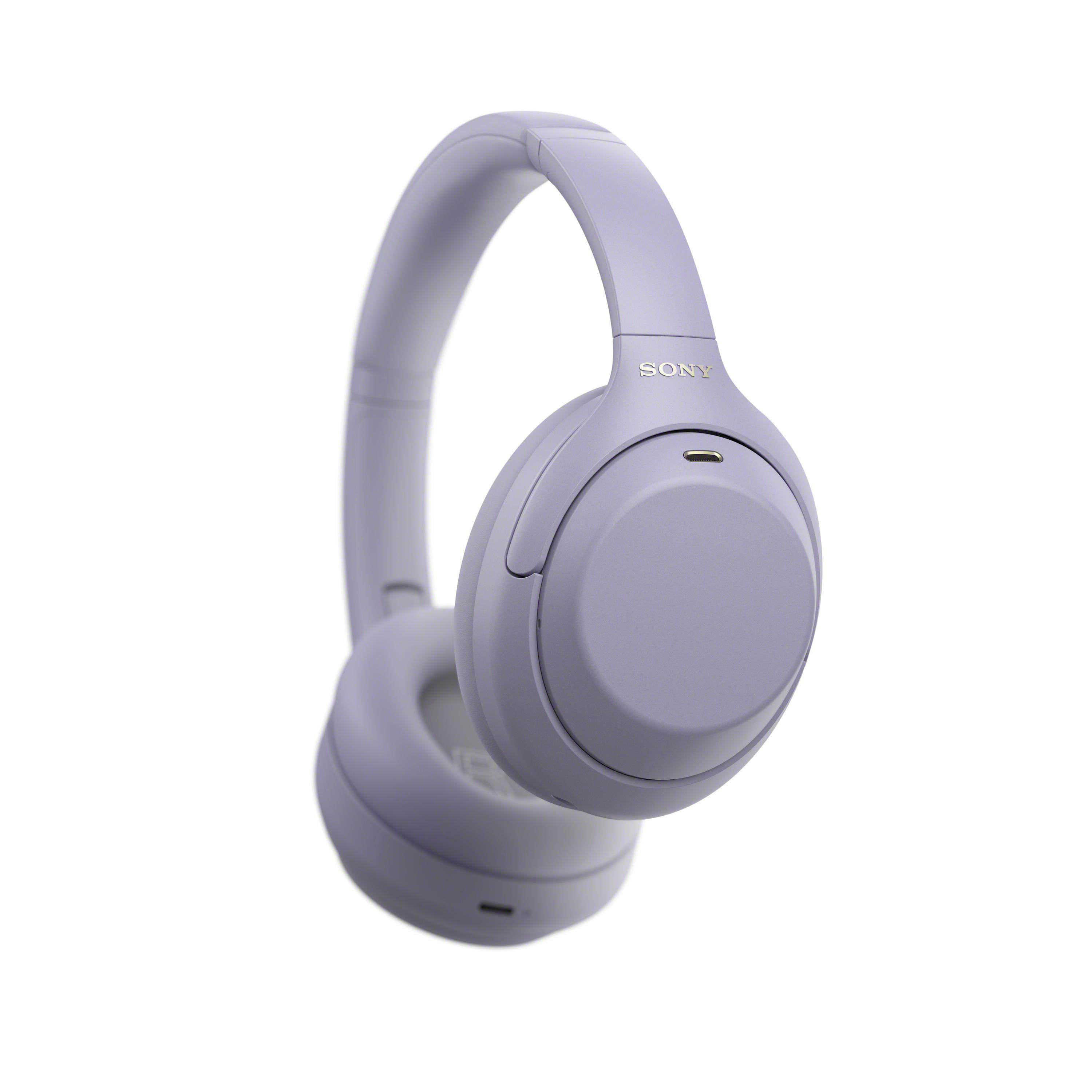 Hellviolette kabellose Over-Ear-Kopfhörer von Sony mit verstellbarem Kopfbügel auf weißem Hintergrund.
