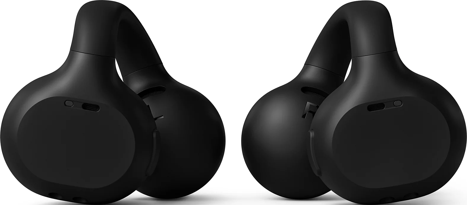 Deux écouteurs ouverts noirs au design arrondi sur fond clair.