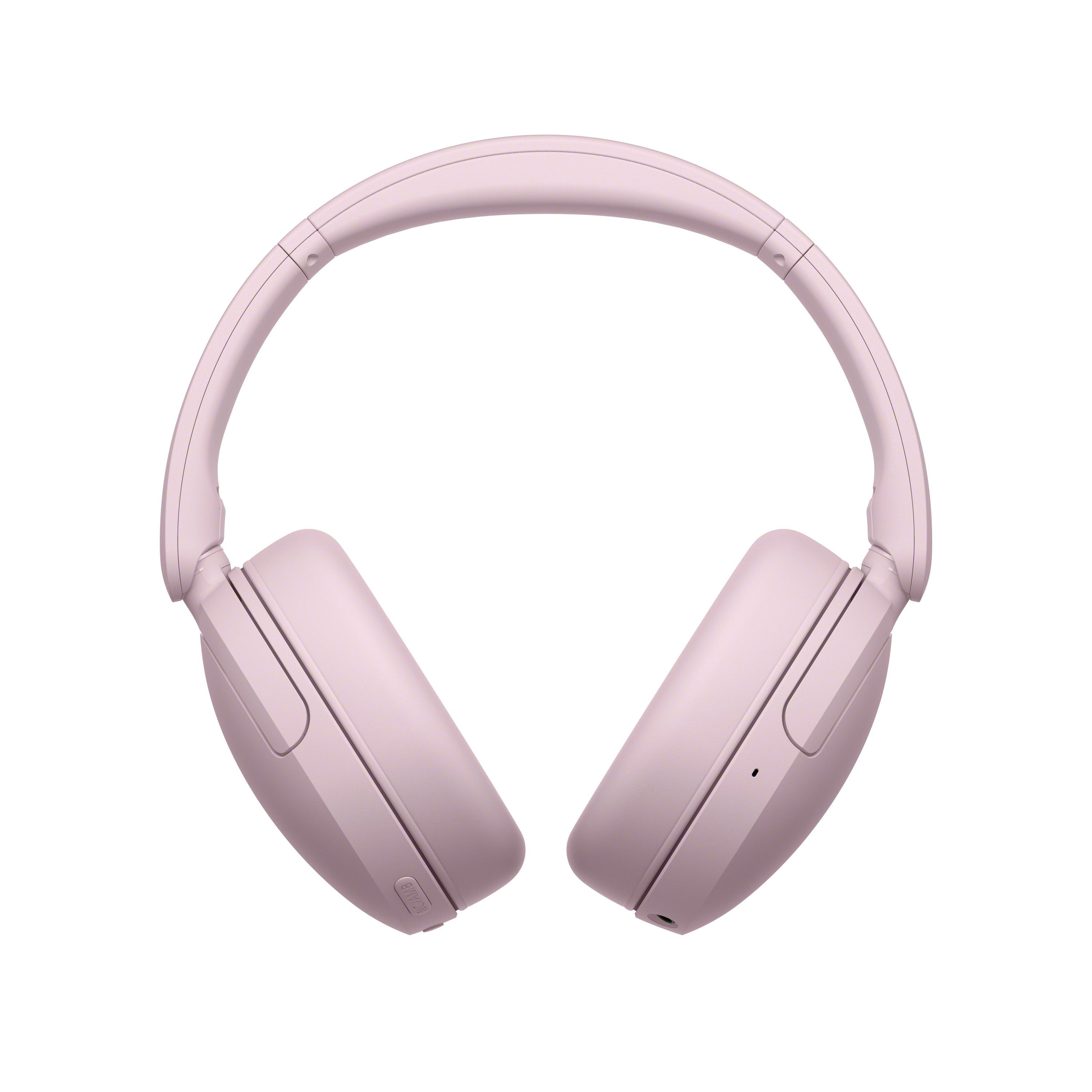 Mattes, rosa, kabelloses Over-Ear-Headset mit gepolsterten Ohrmuscheln auf weißem Hintergrund.