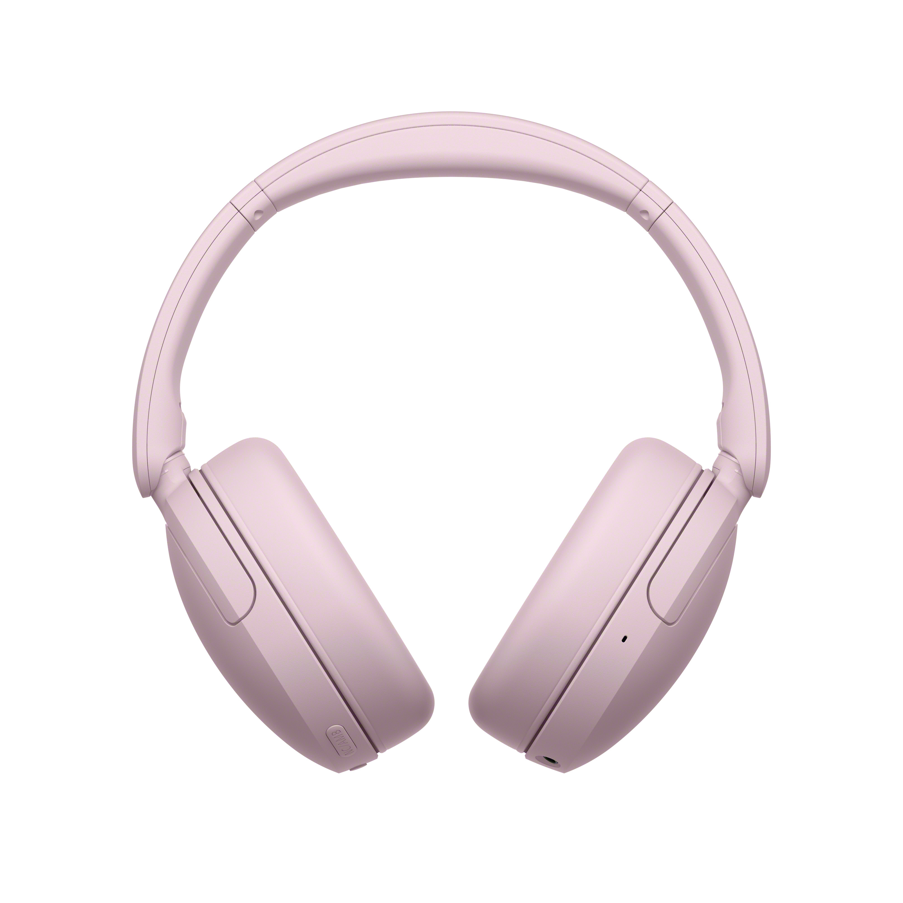 Casque sans fil rose sur fond blanc.