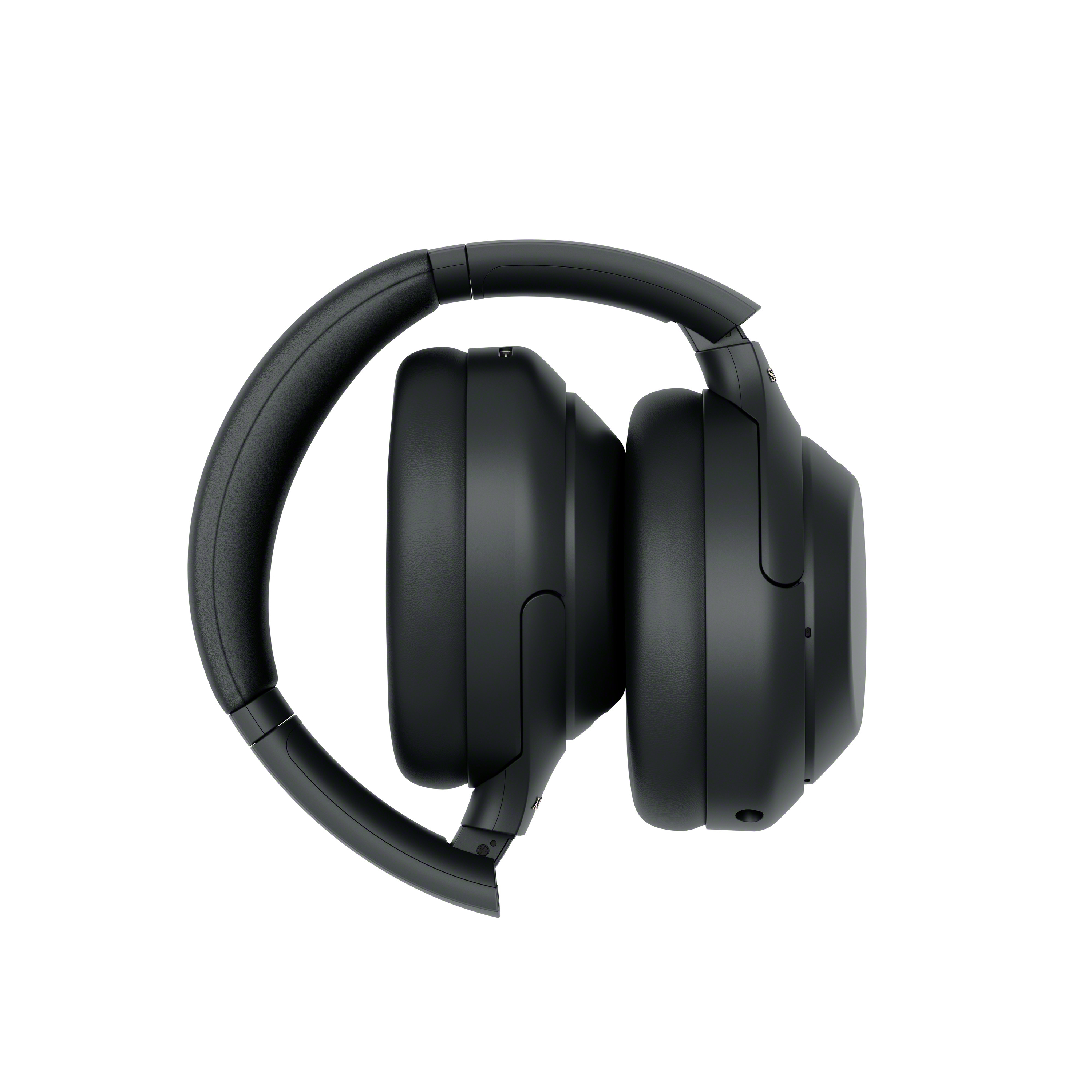 Schwarze Over-Ear-Kopfhörer mit gepolstertem Bügel und Ohrmuscheln auf weißem Hintergrund.