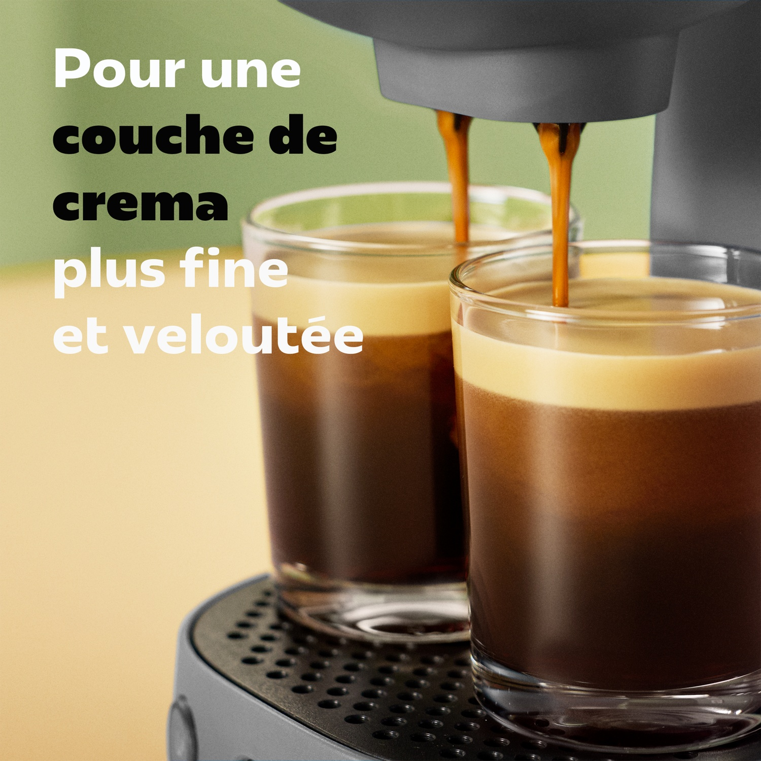 Machine à café remplissant deux tasses d'espresso et de crema fine.