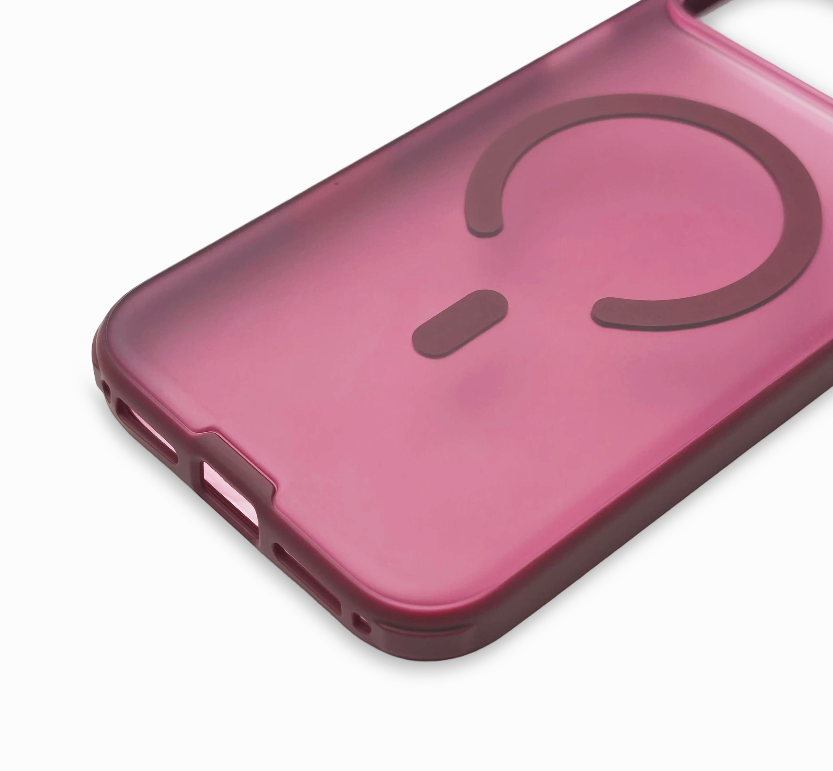Arka tarafında dairesel mıknatıs simgesi bulunan mat pembe telefon kılıfı.
