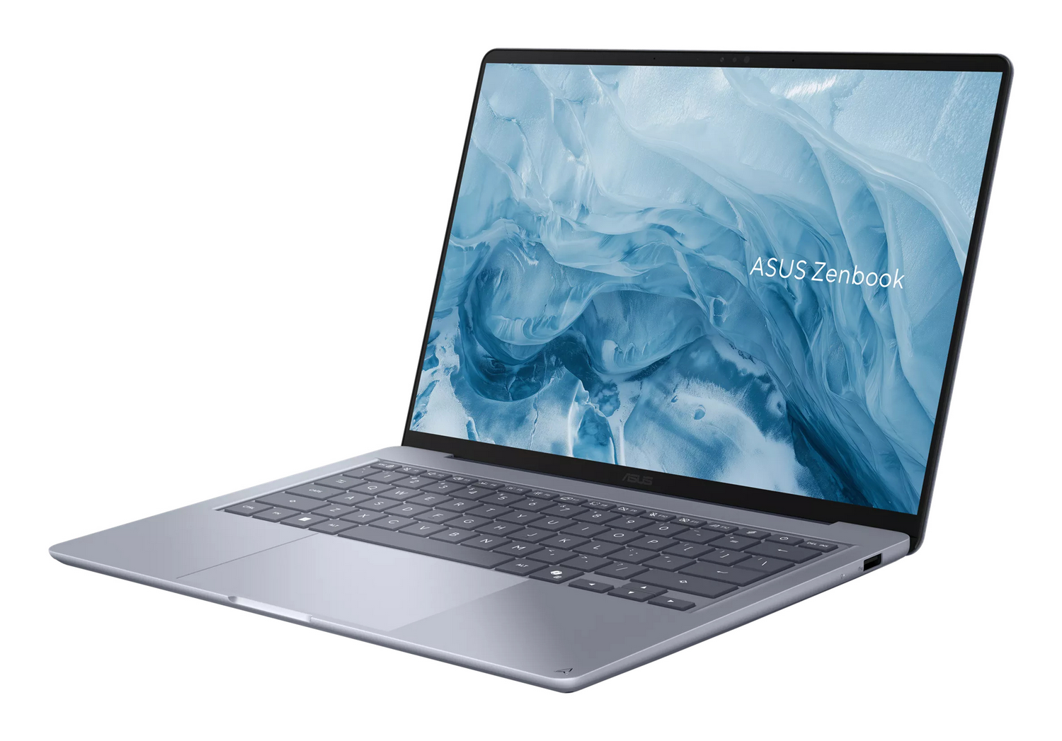 Un portátil plateado ASUS Zenbook está abierto sobre un fondo blanco con un fondo de pantalla azul.
