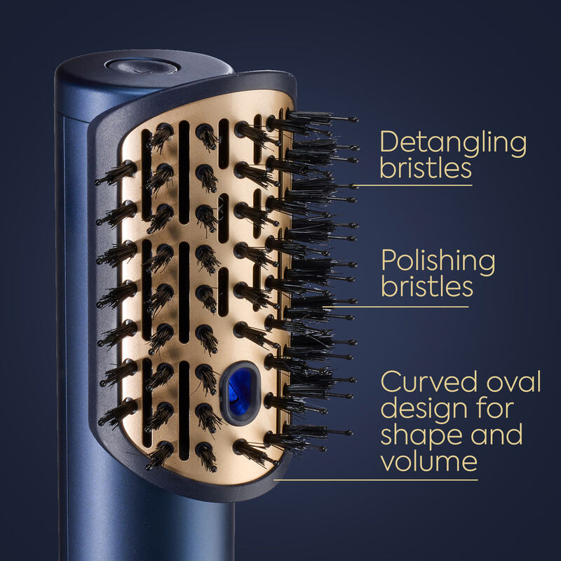Brosse à cheveux bleue avec plaque dorée, poils noirs et étiquettes de texte descriptives.