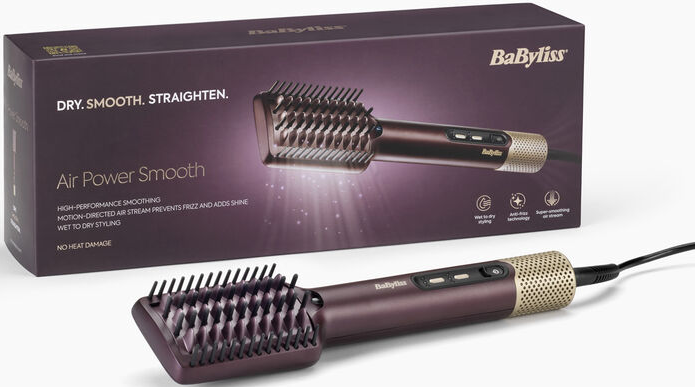 Une brosse coiffante violette BaByliss Air Power Smooth repose sur fond blanc devant sa boîte de produit.