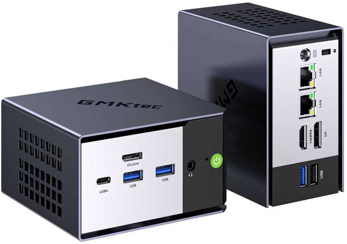 Két GMKtec mini PC ezüst előlappal, USB-portokkal és bekapcsológombbal fehér háttér előtt.