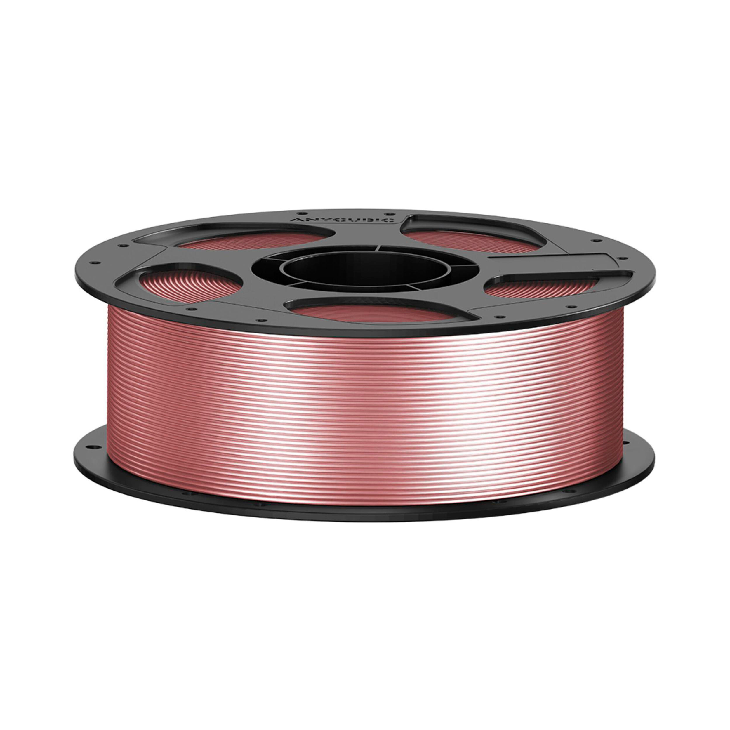 Eine schwarze Spule gefüllt mit rosa 3D-Drucker-Filament vor weißem Hintergrund.