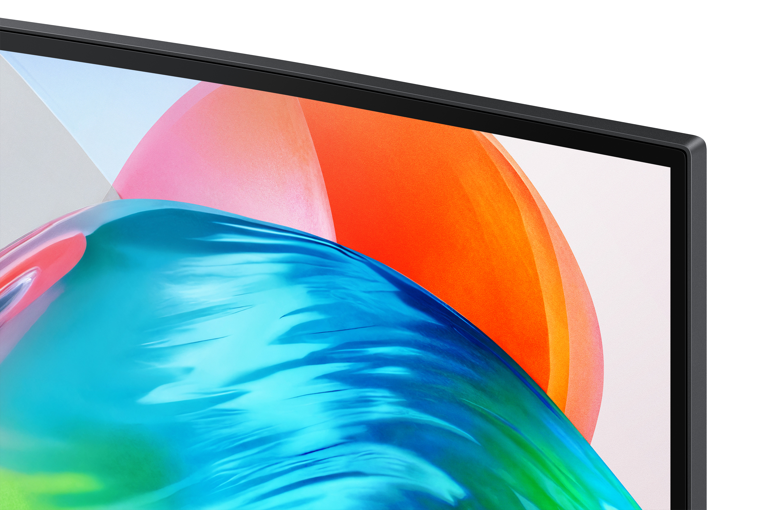 Primer plano de la esquina superior derecha de un monitor que muestra un fondo de pantalla abstracto colorido de ondas naranjas, azules y blancas.