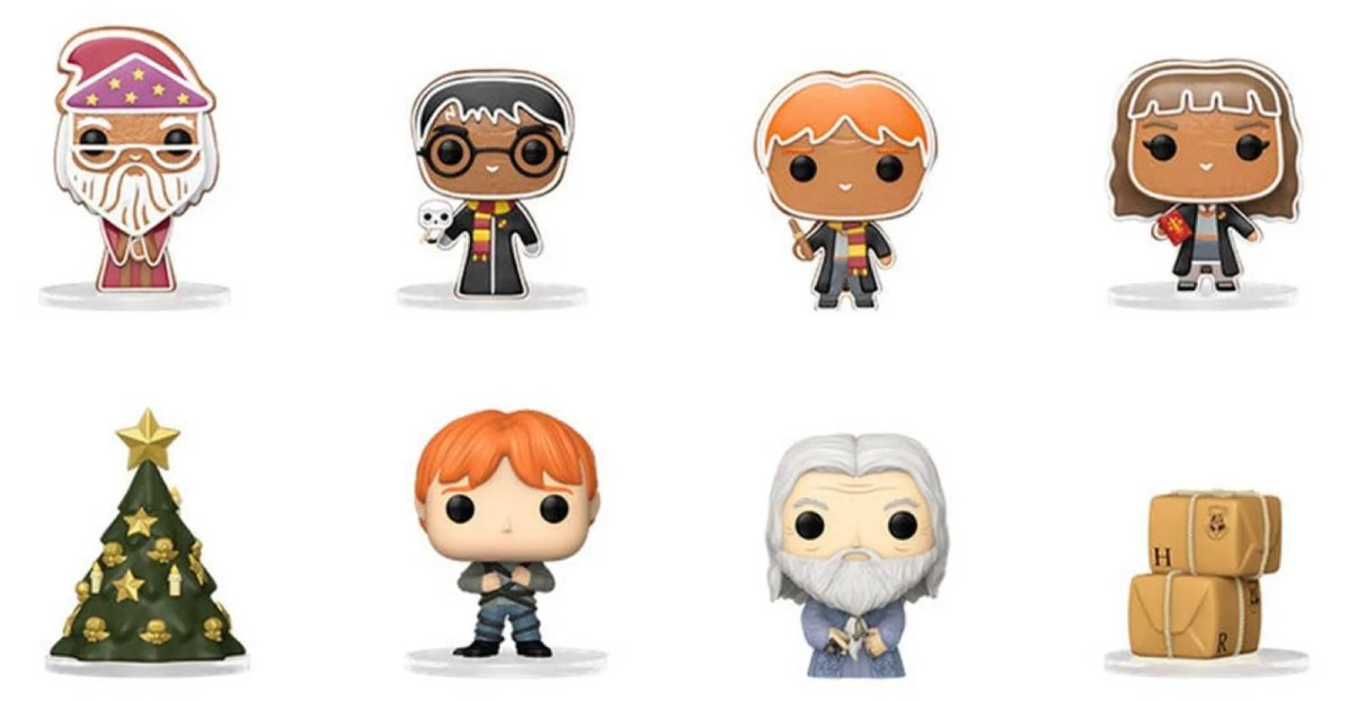 Figuras de vinilo de Harry Potter y artículos festivos sobre bases transparentes.