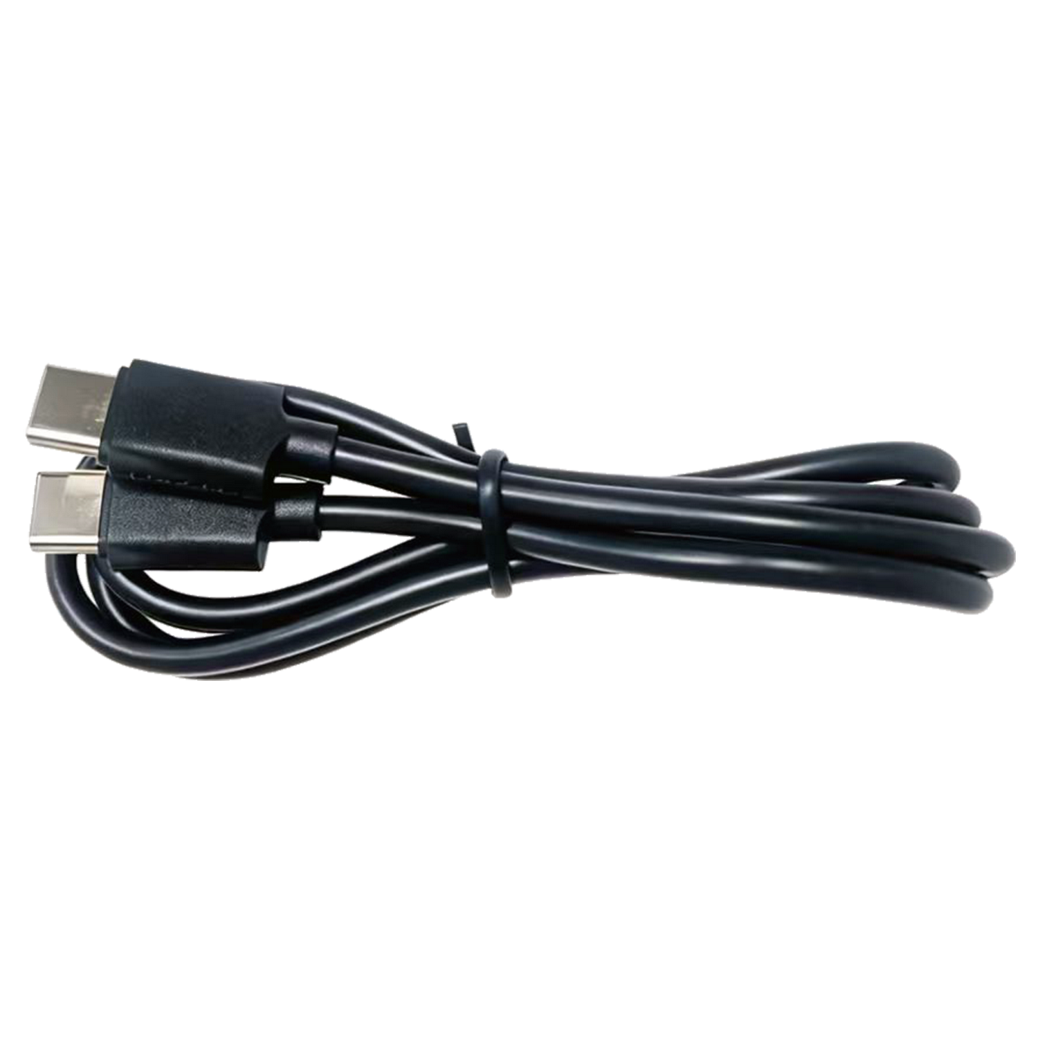 Un cable USB-C negro enrollado sobre un fondo negro.