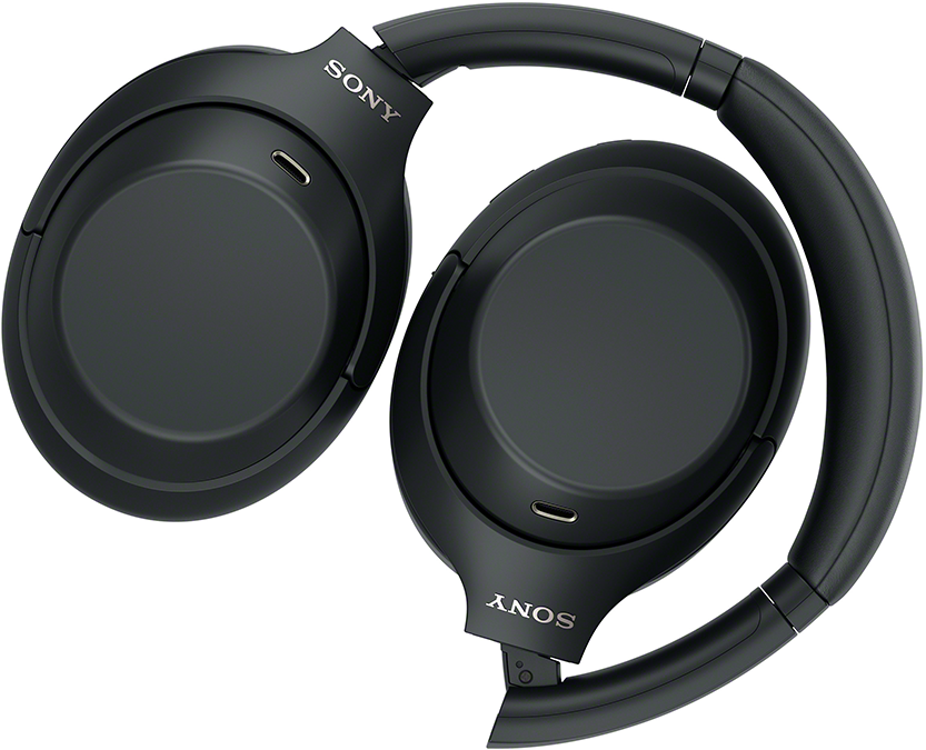 Fekete színű, összecsukott Sony fülhallgató fehér háttér előtt.