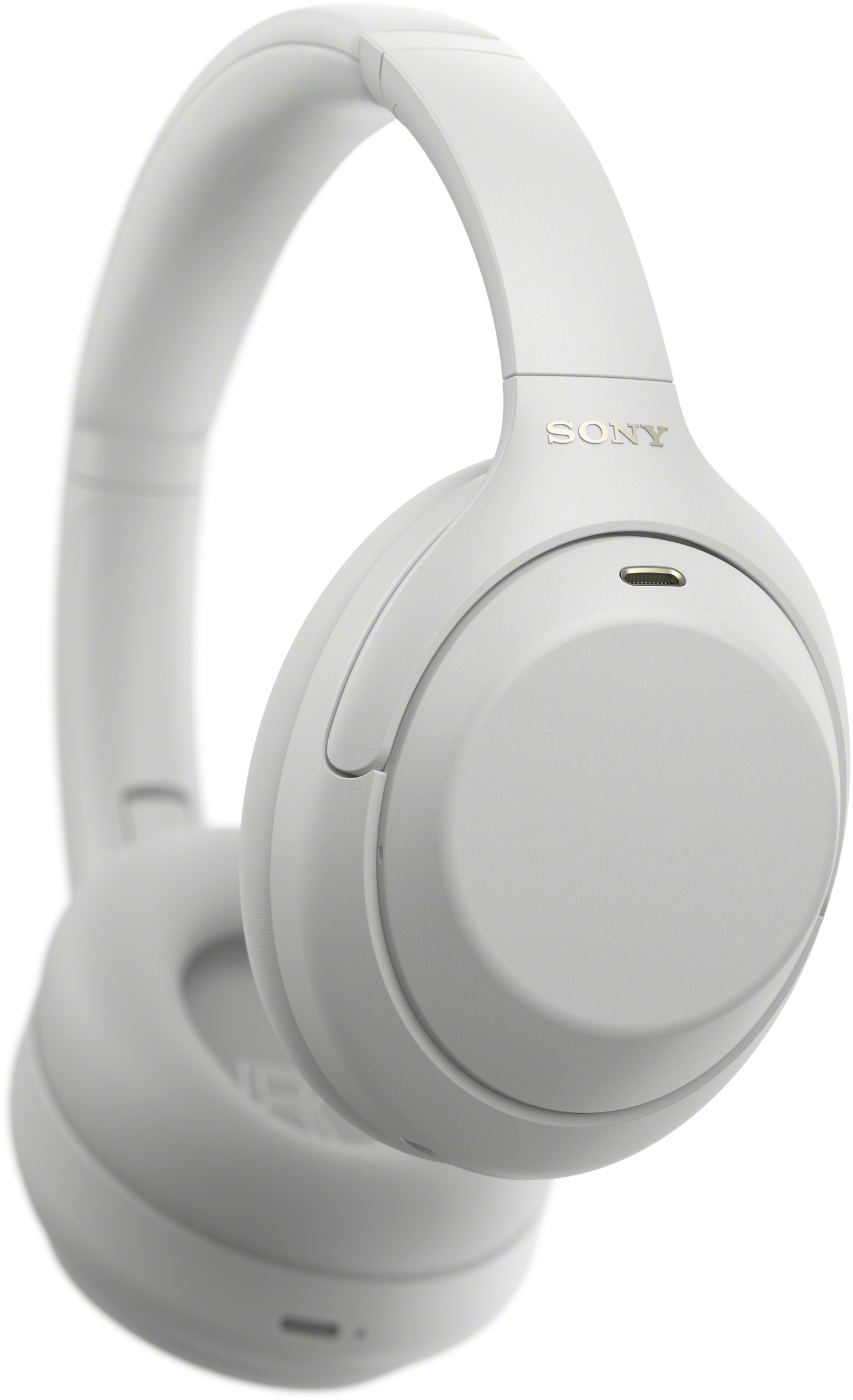 Fehér színű, vezeték nélküli Sony fejhallgató közelről, sima fehér háttérrel.