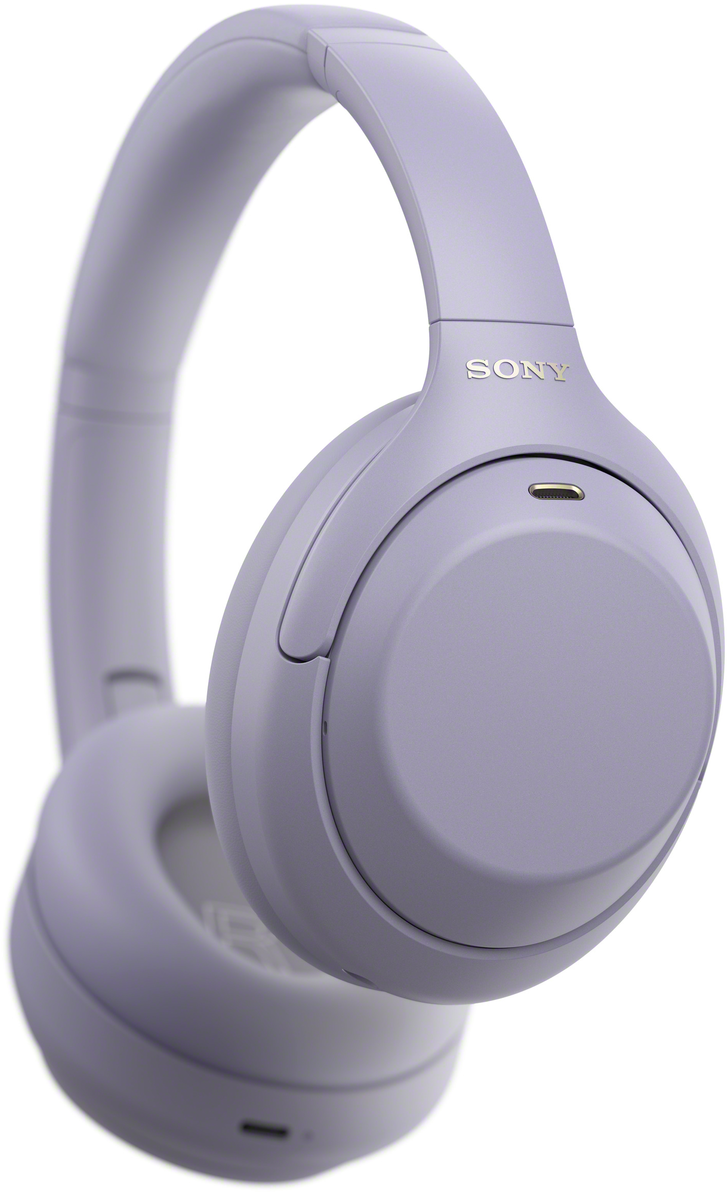 Lila Sony fülhallgató fehér háttér előtt.