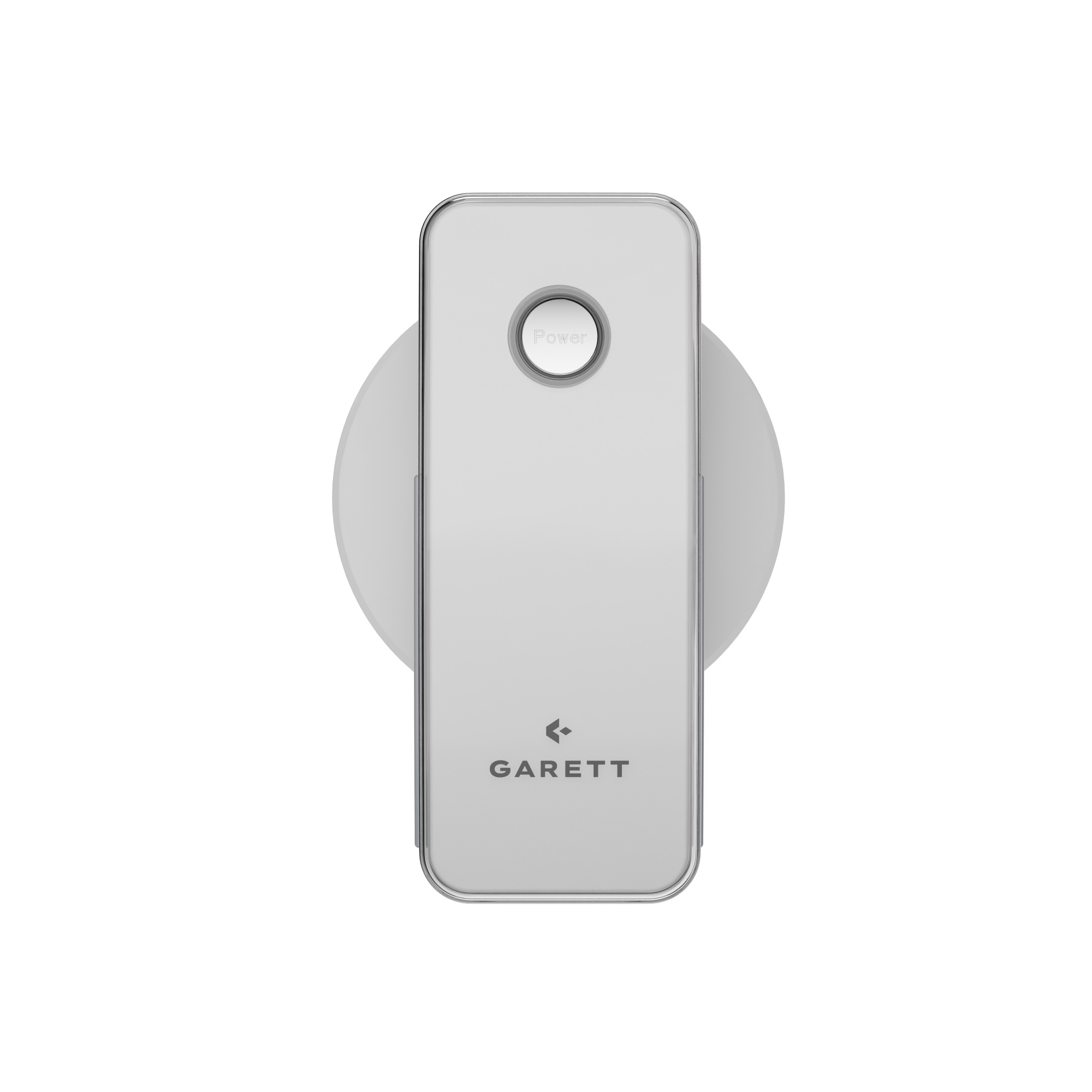 Egy ezüst Garett power bank egy kerek szürke vezeték nélküli töltőn, fehér háttér előtt.