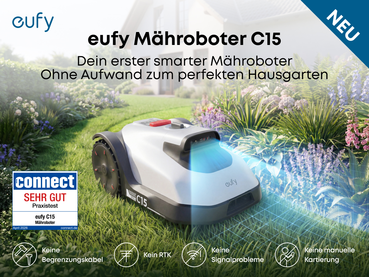 Eufy Mähroboter C15 auf grünem Rasen vor einem Haus mit Garten.