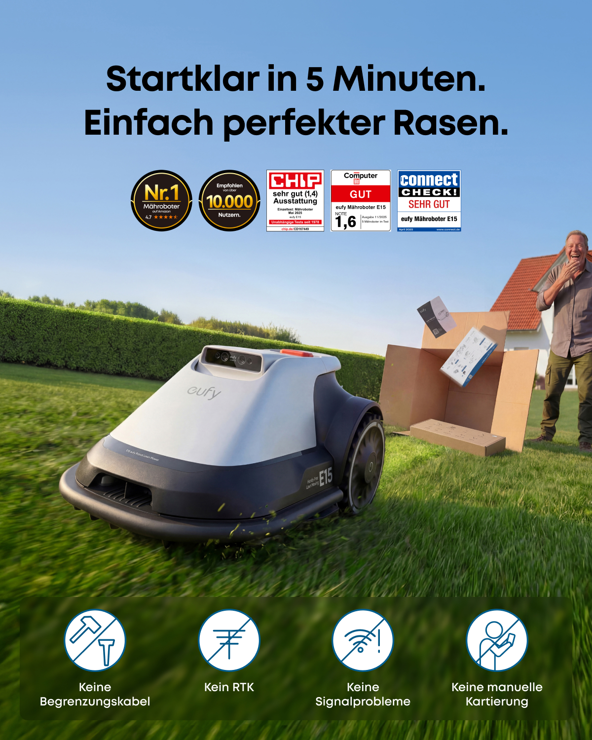 Ein weiß-grauer Mähroboter steht auf dem Rasen, während ein Mann freudig zuschaut, wie Kartons auspacken.