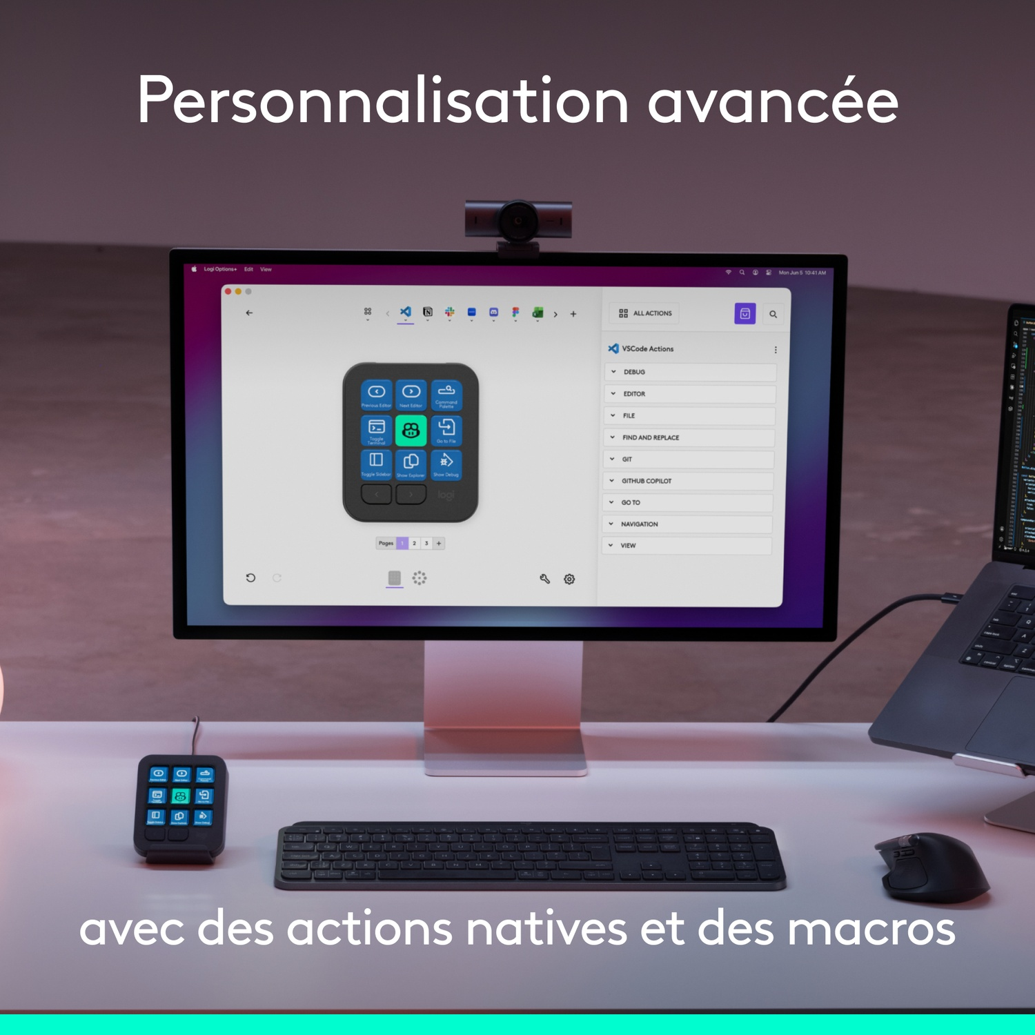 Un bureau avec un moniteur affichant une interface logicielle, un clavier, une souris et un petit pavé de macro.