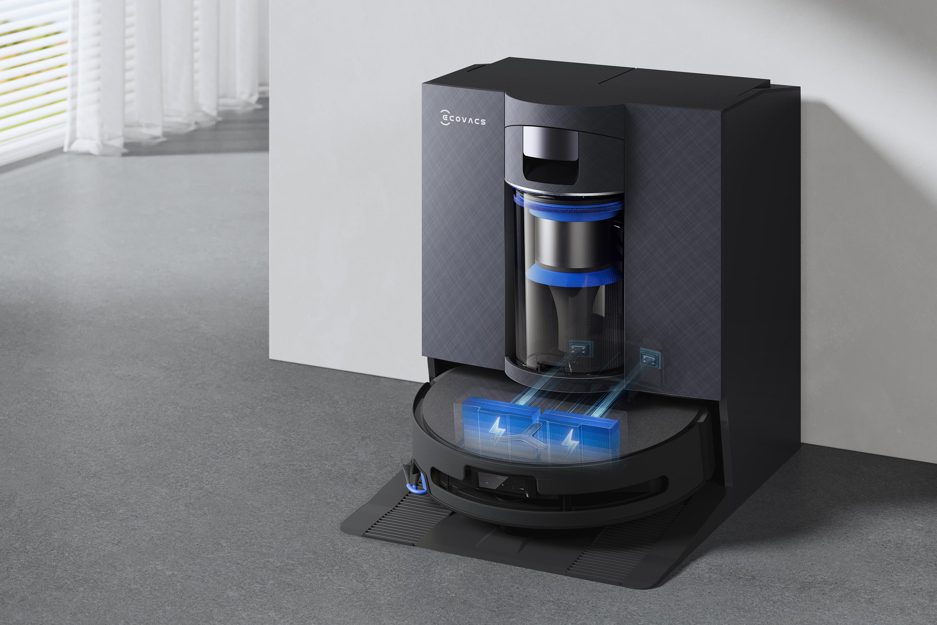 Ein schwarzer Ecovacs Staubsaugerroboter lädt in seiner Basisstation, mit blauen Grafikelementen.