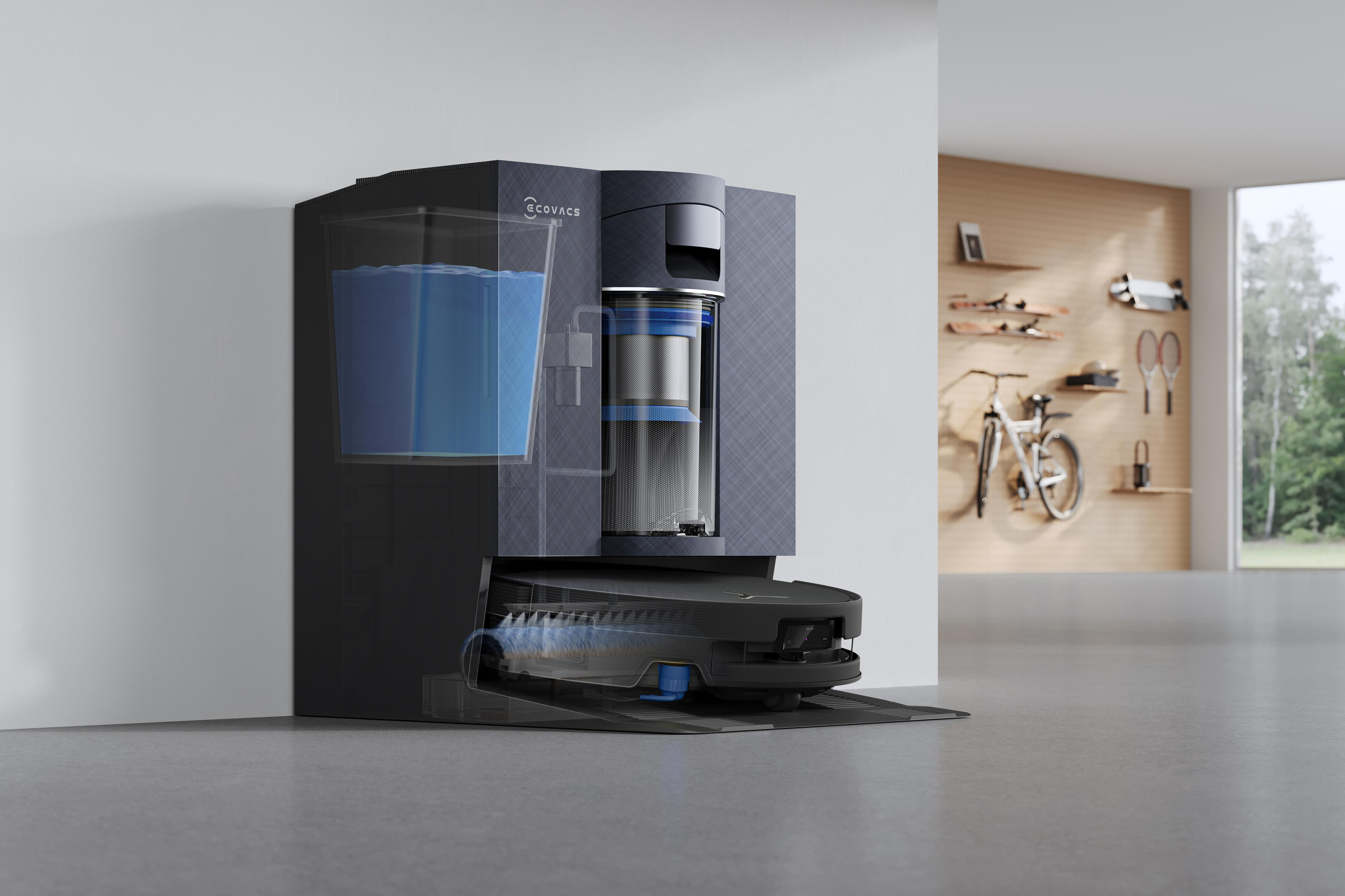 Schnittansicht einer schwarzen Ecovacs-Roboterstaubsauger-Ladestation mit Wassertank und Filter im Innenraum.