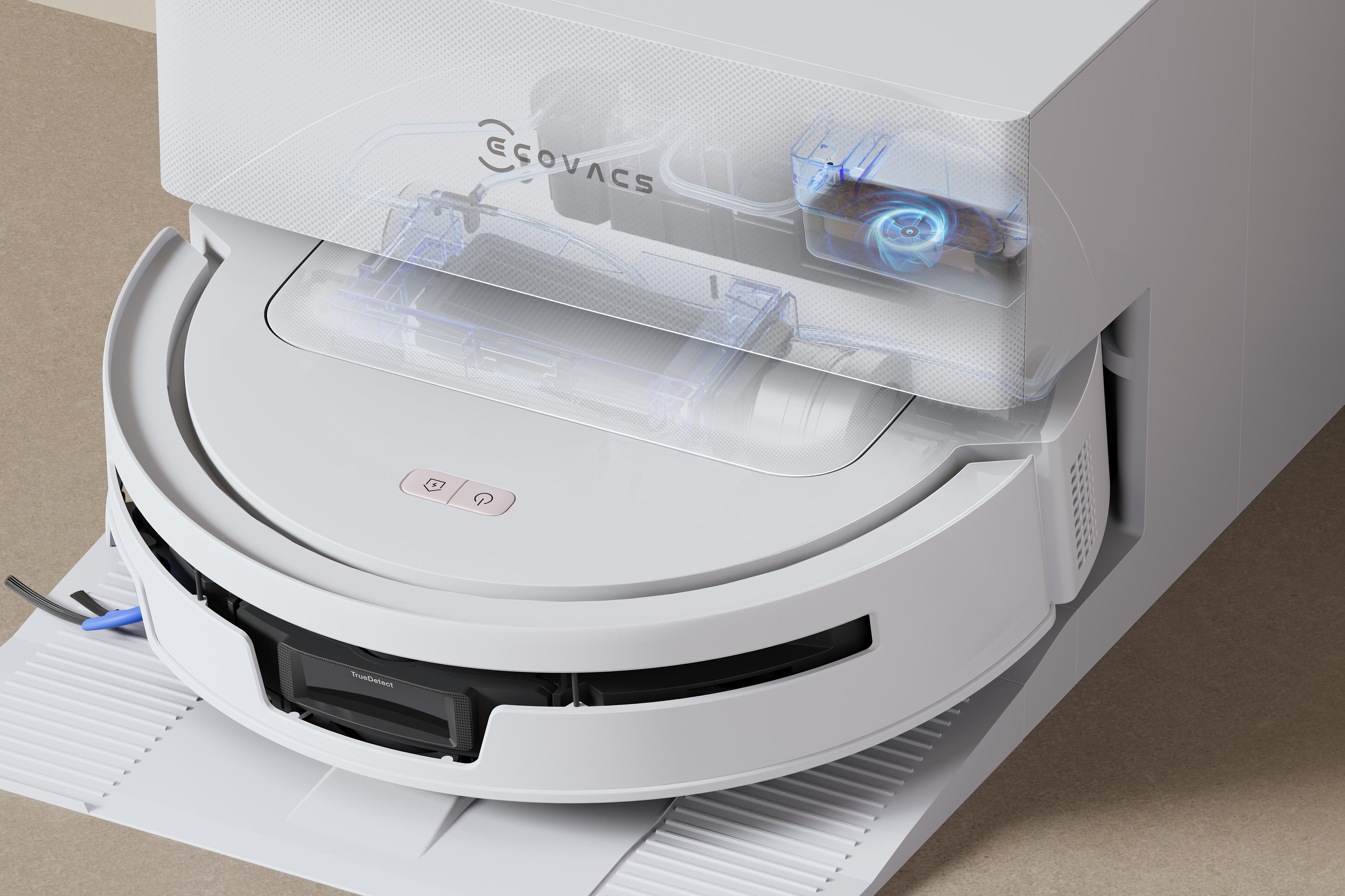 Ein weißer Ecovacs Saugroboter auf seiner Ladestation zeigt transparent seine Innere Mechanik.