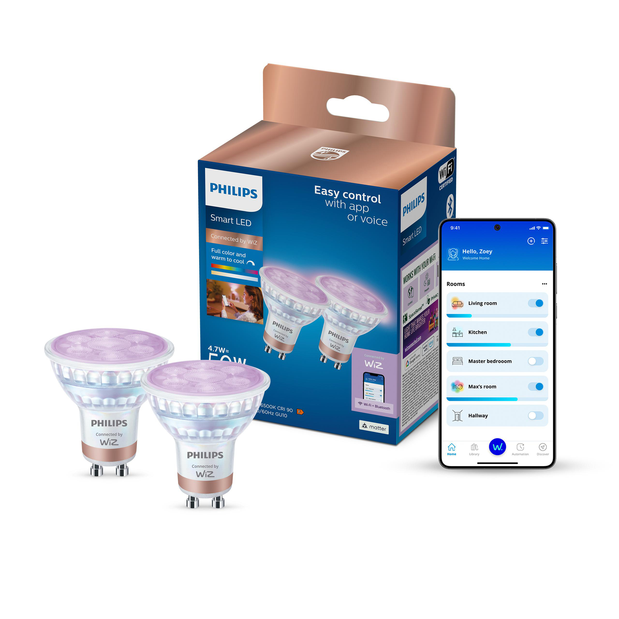 Zwei Philips Smart-LED-Lampen vor ihrer Produktverpackung und ein Smartphone mit der Steuerungs-App.