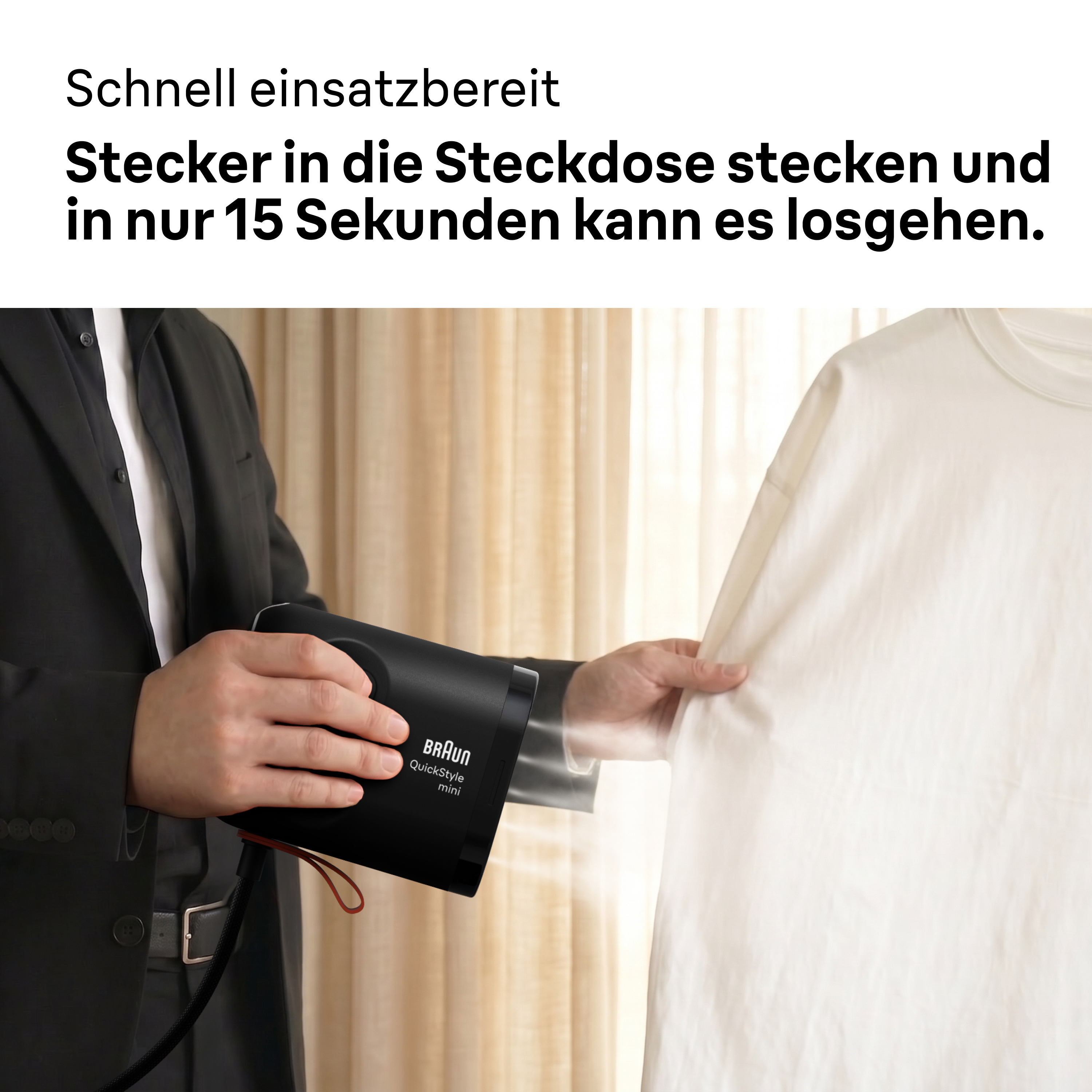 Ein Mann im schwarzen Anzug benutzt einen tragbaren schwarzen Dampfblätter an einem weißen Hemd.