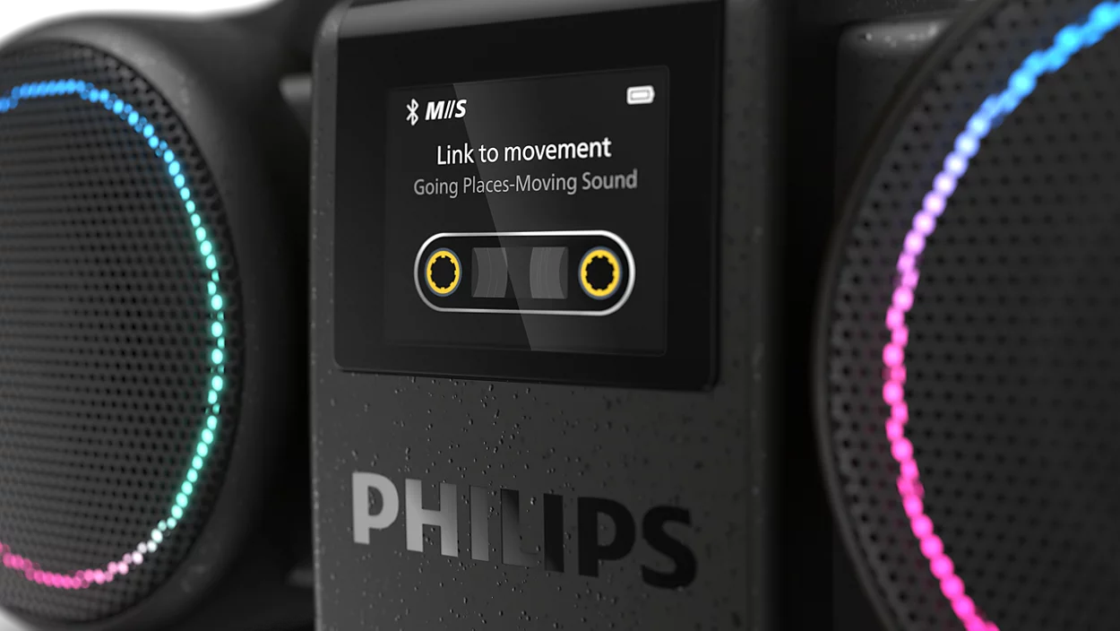 Fekete Philips Bluetooth hangszóró kijelzővel, kazetta grafikával és megvilágított oldalaival.
