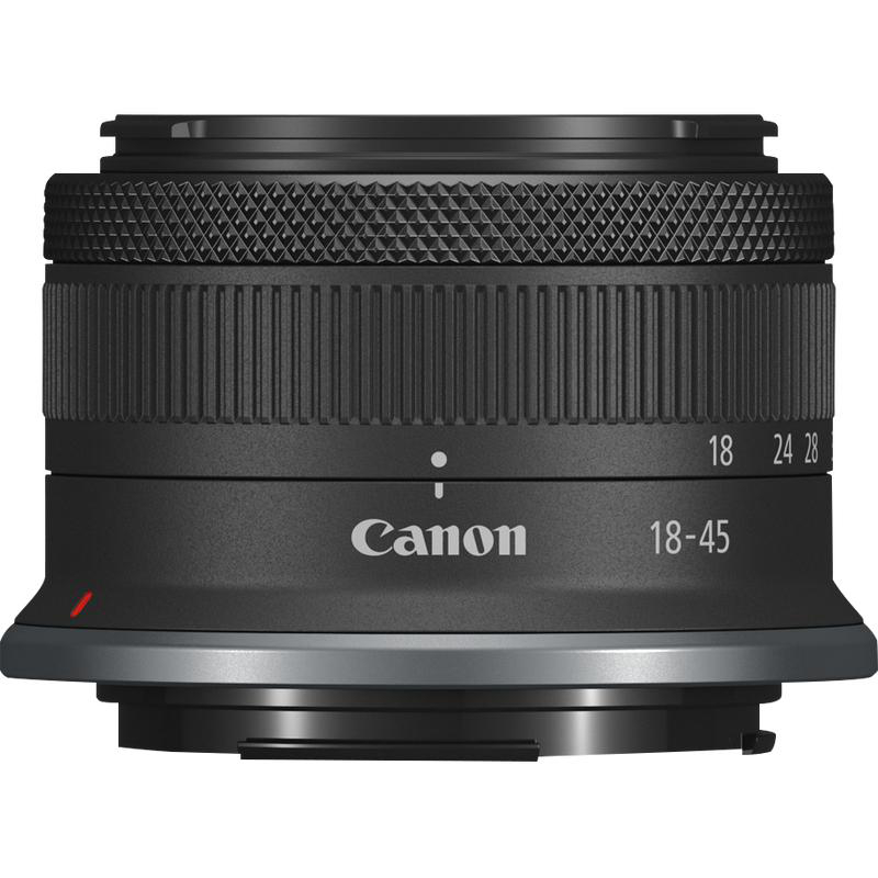 Schwarzes Canon RF-S 18-45mm Objektiv mit geriffeltem Fokusring auf neutralem Hintergrund.