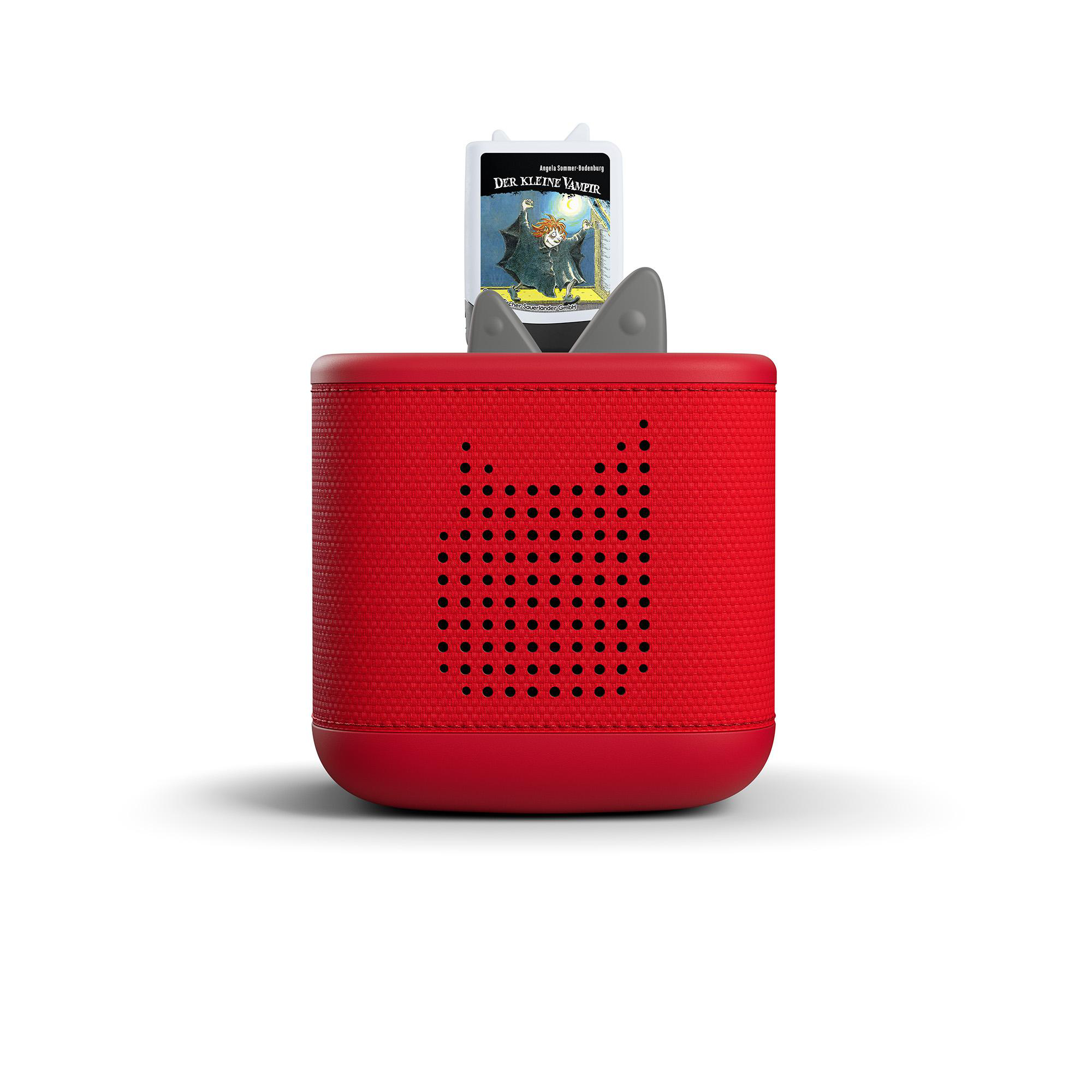 Roter Toniebox-Audioplayer mit einer kleinen Vampir-Hörspielfigur auf der Oberseite.