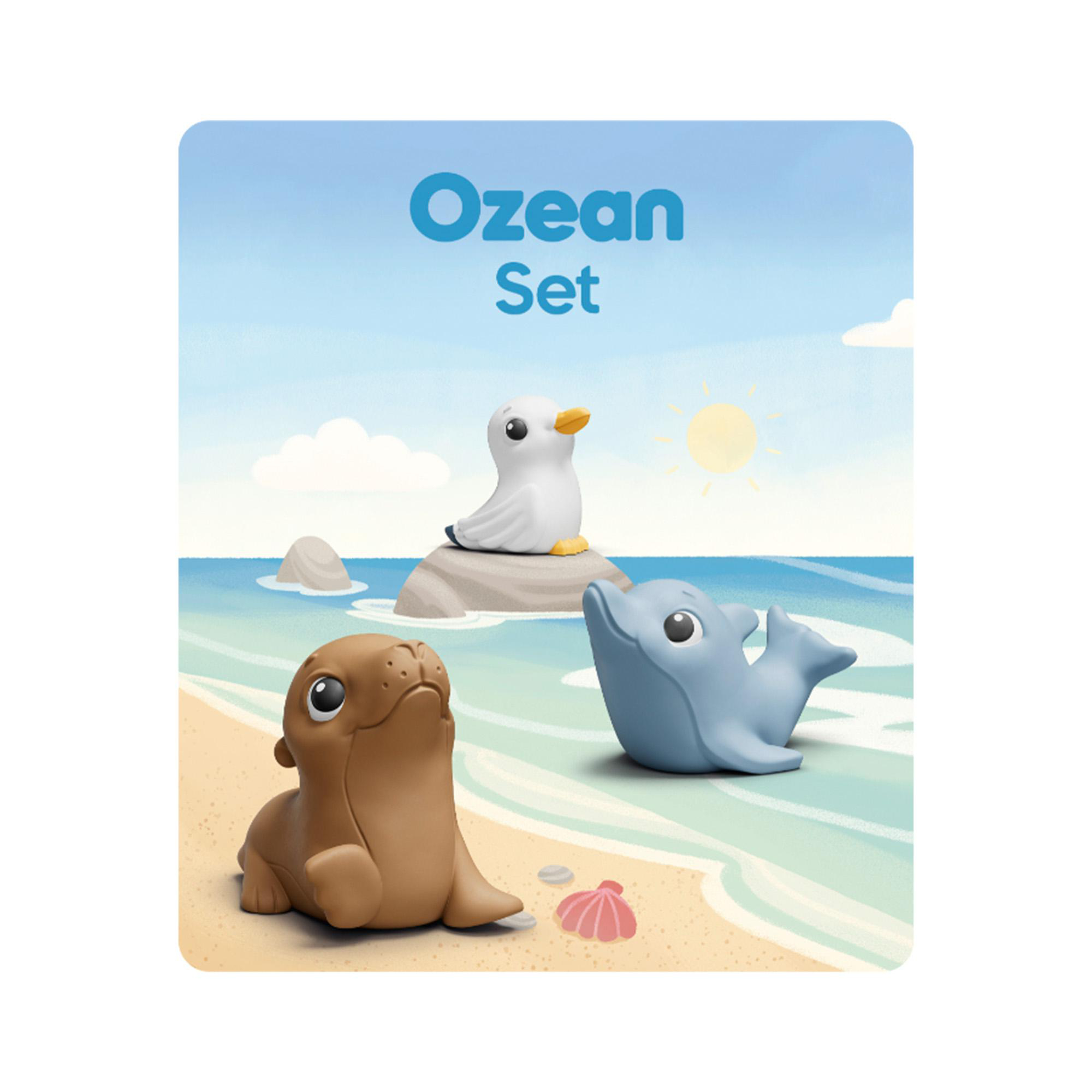 Ozean-Set mit Spielzeugtieren wie Robbe, Delfin und Möwe am Strand unter blauem Himmel mit Sonne.
