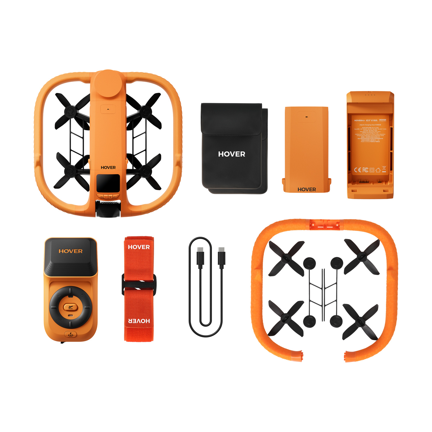 Un drone arancione con accessori tra cui custodia, batteria, hub di ricarica, telecomando, cinghia e cavo.