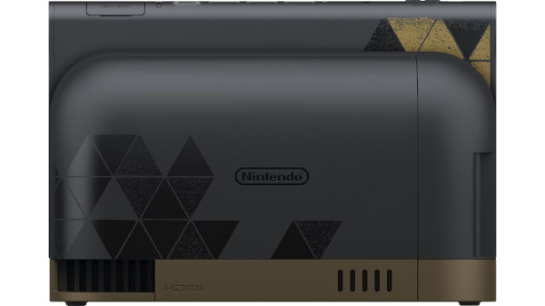 Szara stacja dokująca Nintendo Switch z geometrycznymi wzorami i złotymi akcentami na dole.