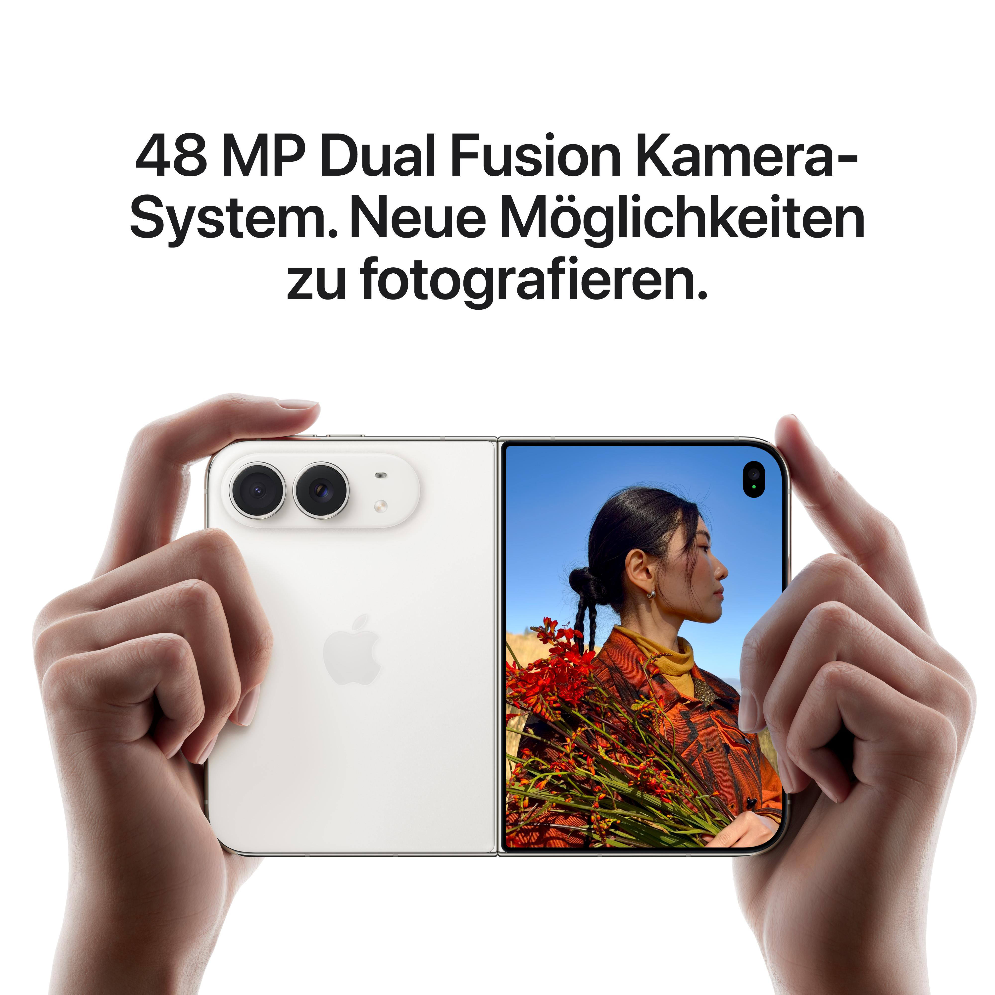 Ein weißes Falt-Smartphone mit Dual-Kamera wird in Händen gehalten, Text über 48-MP-Kamera.