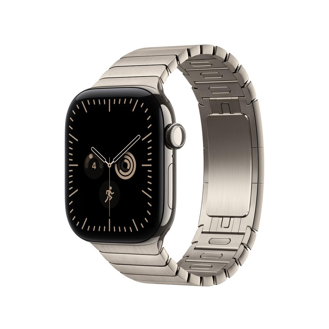 Eine Apple Watch mit Metallarmband und schwarzem Display vor weißem Hintergrund.