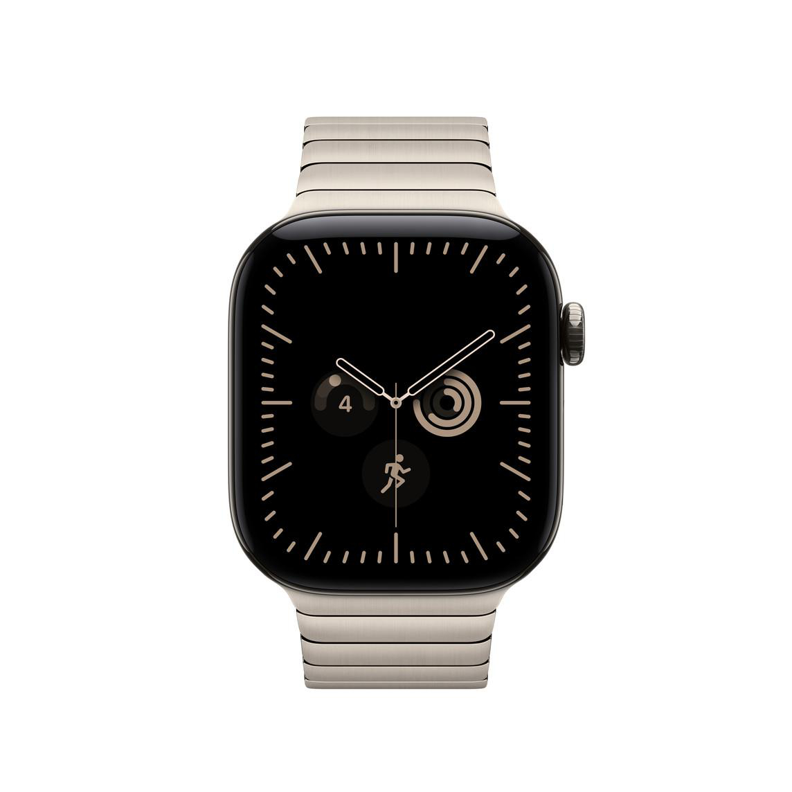 Eine silberne Smartwatch mit Metallarmband und schwarzem Display zeigt weiße Zeiger und Aktivitätsringe.
