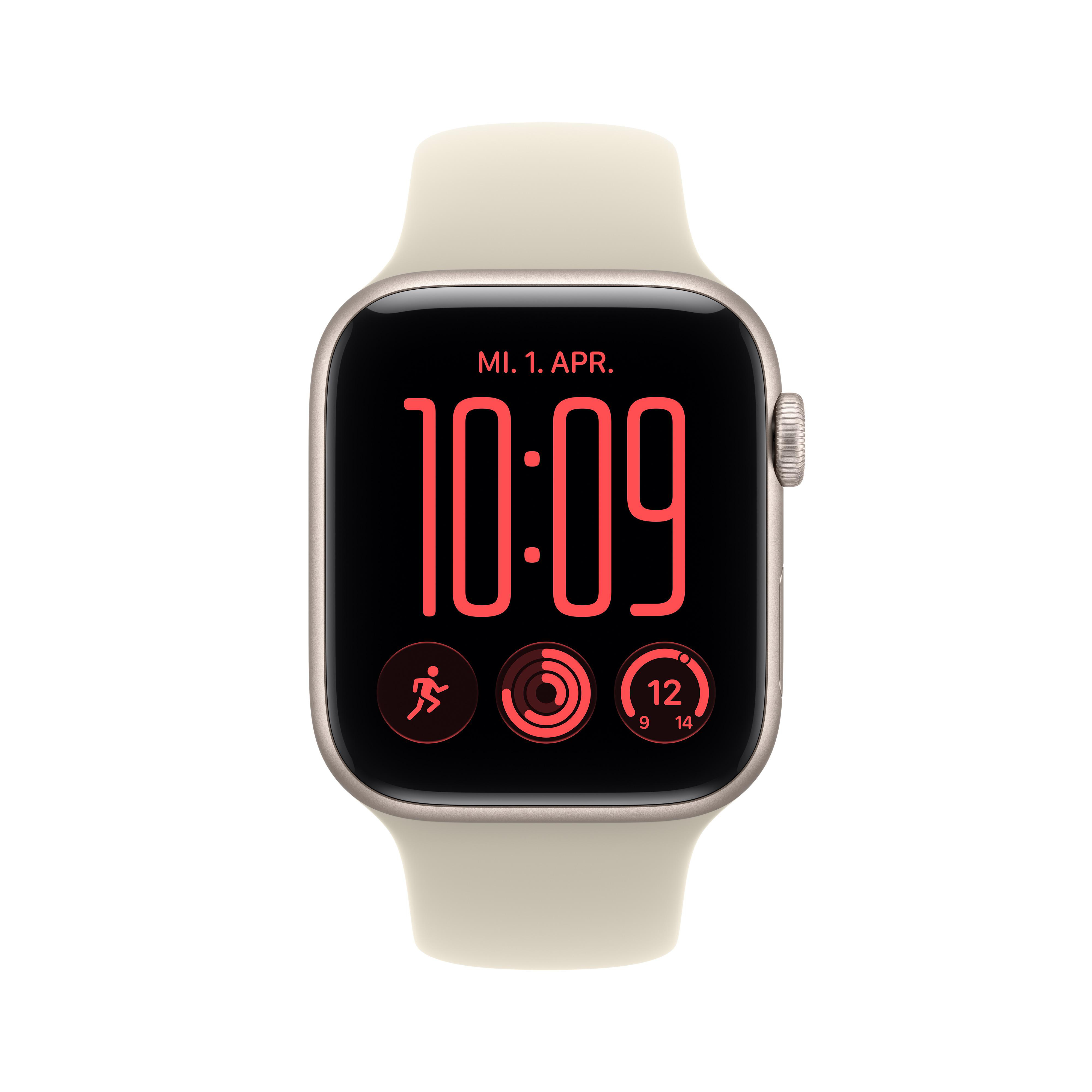 Eine beigefarbene Smartwatch mit digitalem Display zeigt 10:09, Datum und Fitnessringe auf schwarzem Hintergrund.