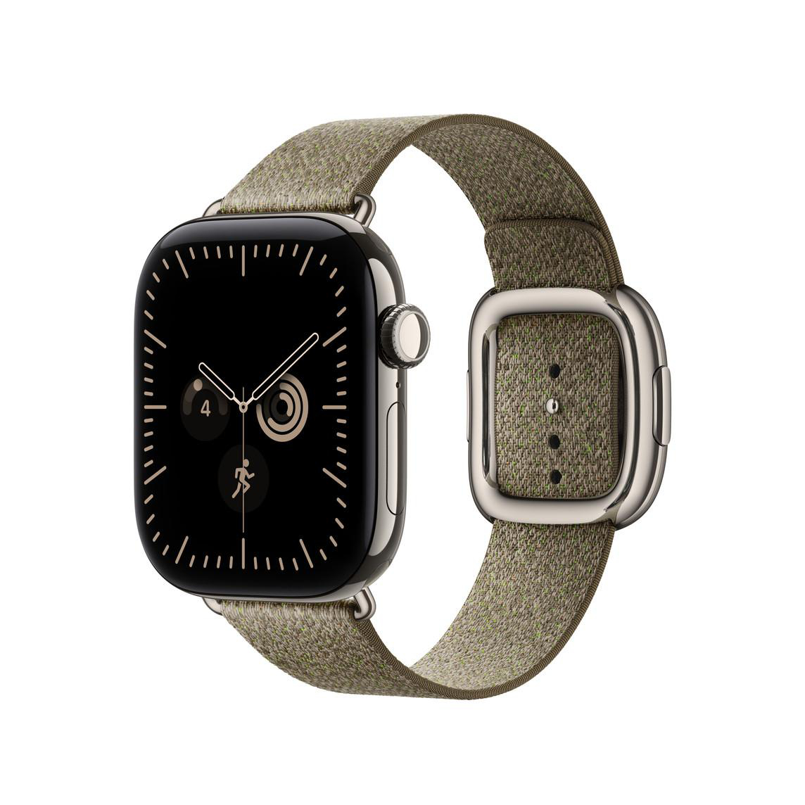 Eine graue Smartwatch mit einem olivgrünen Stoffarmband vor weißem Hintergrund.