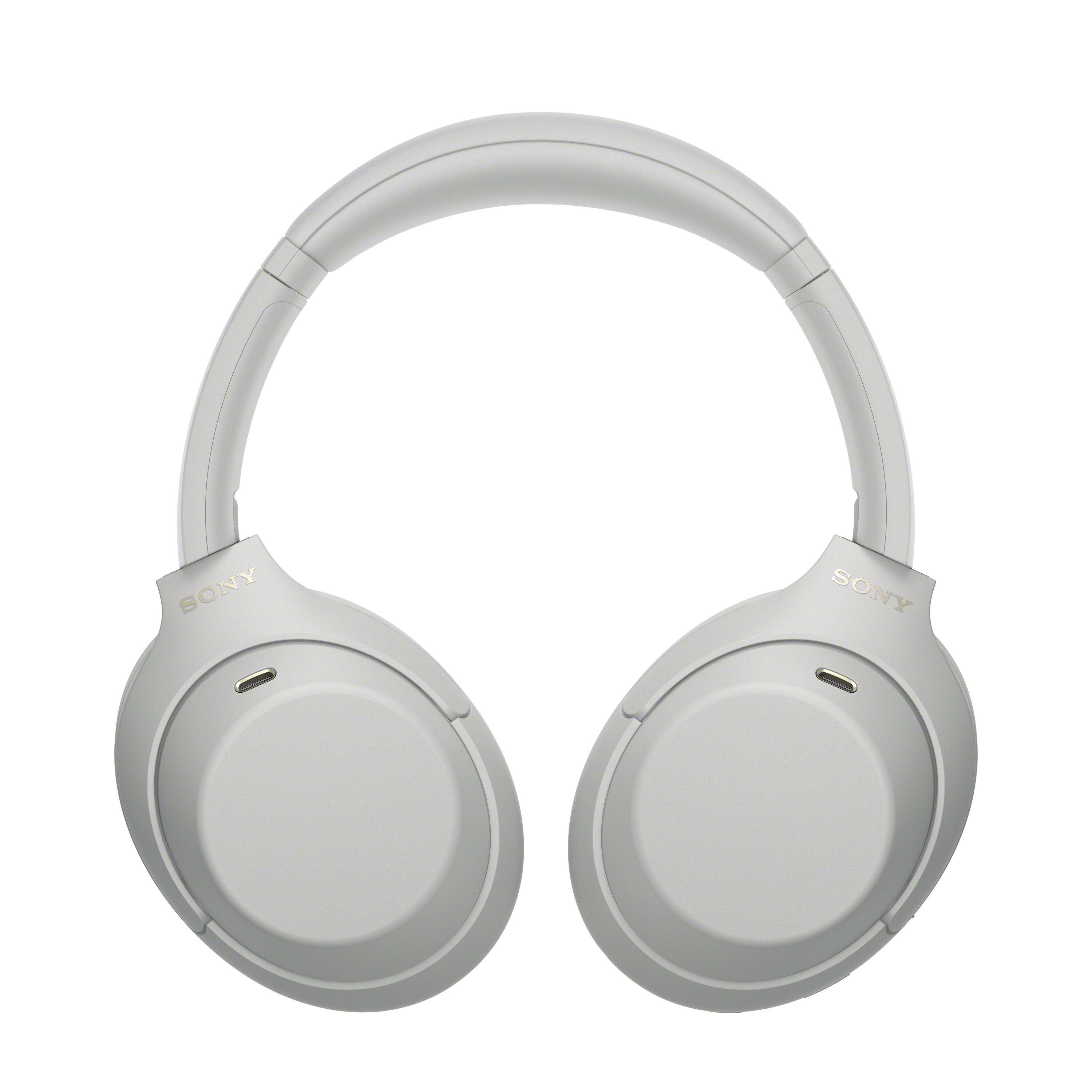 Auriculares inalámbricos grises Sony sobre las orejas con fondo blanco.