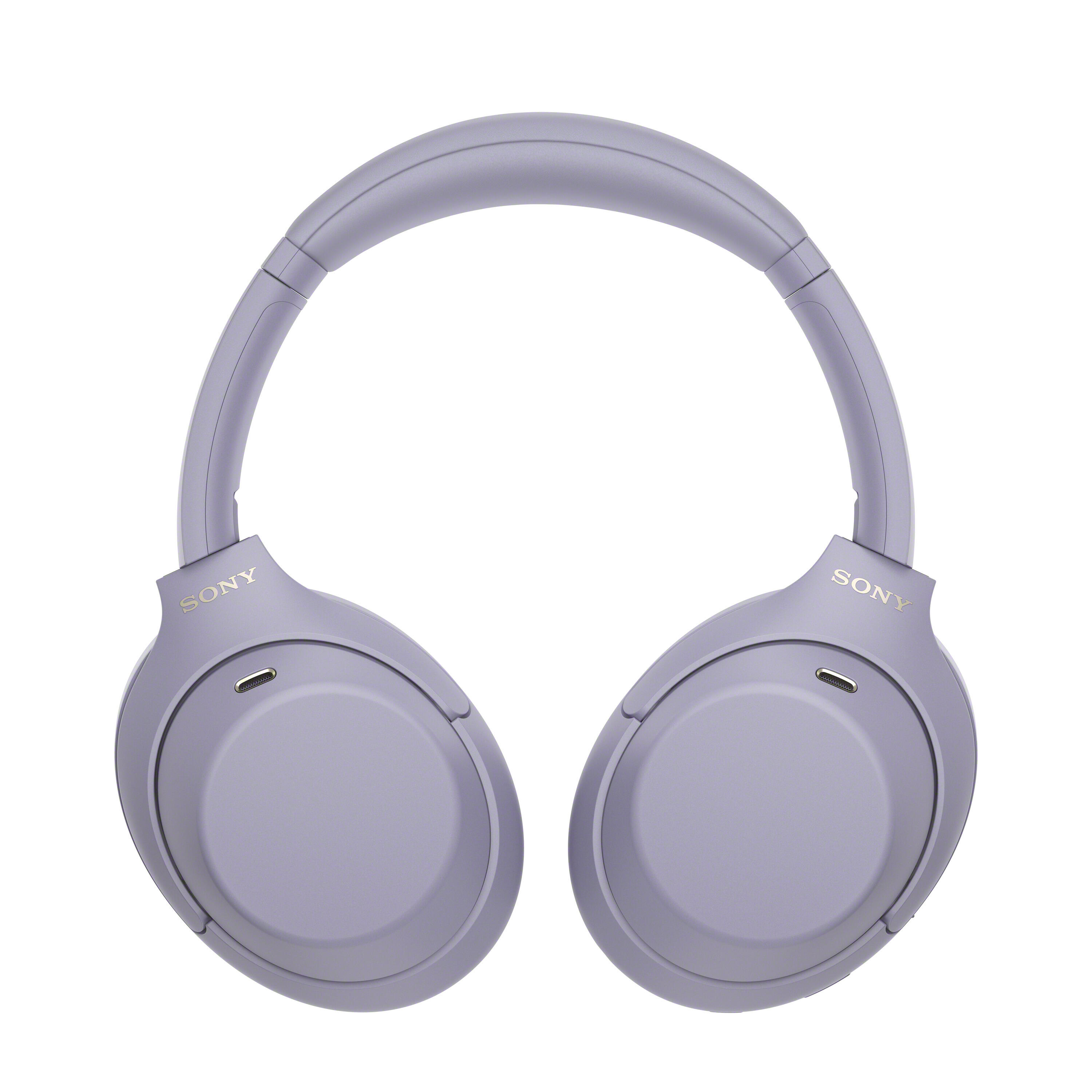 Auriculares supraaurales Sony morados sobre fondo blanco.
