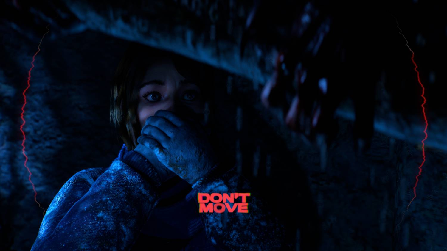 Una mujer se esconde en un espacio oscuro, cubriéndose la boca con las manos. El texto dice "Don't Move".