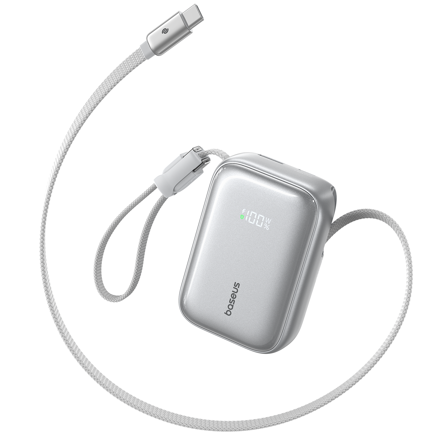 Batería externa Baseus plateada con cable de carga USB-C trenzado integrado y pantalla digital en fondo blanco.
