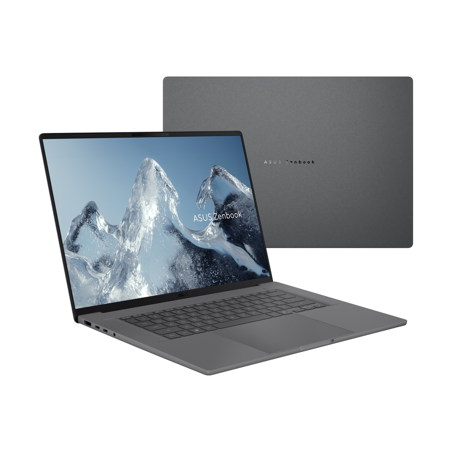 Laptop Asus Zenbook grigio aperto con schermo acceso e il laptop chiuso dietro.