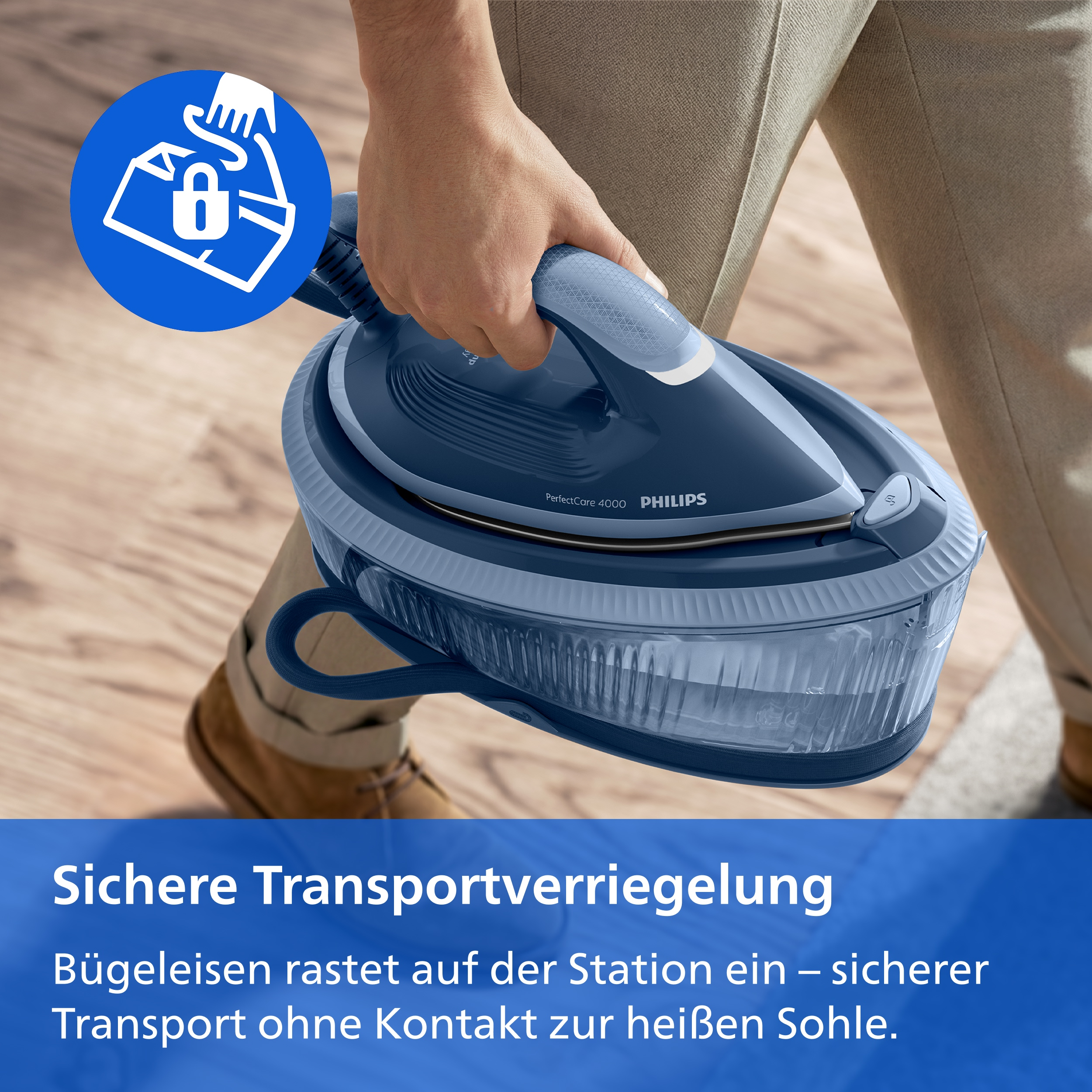 Person trägt blaues Philips Dampfbügeleisen mit sicherer Transportverriegelung an der Basis.