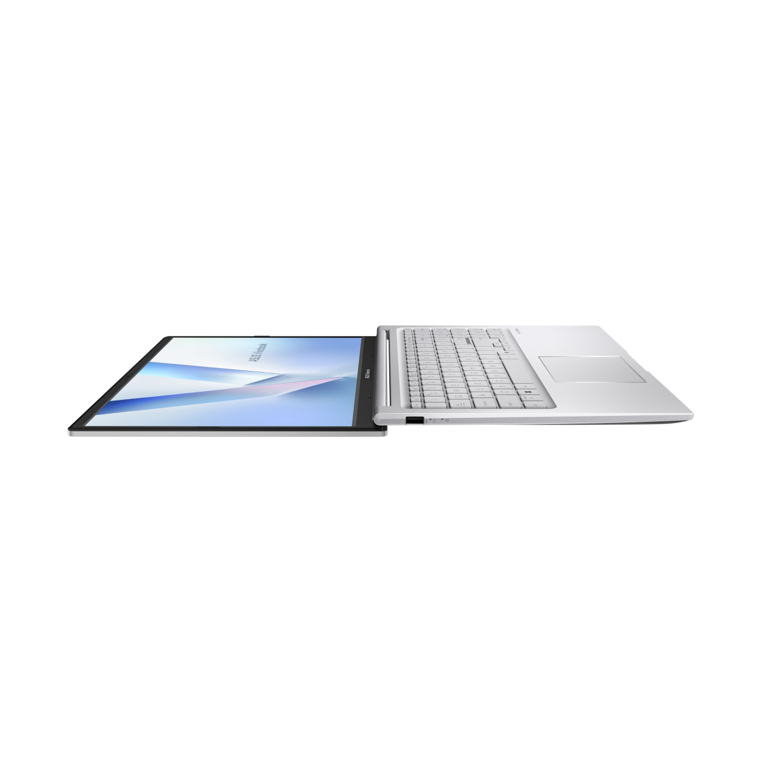 Un laptop argento è aperto piatto su una superficie bianca, mostrando uno schermo colorato.