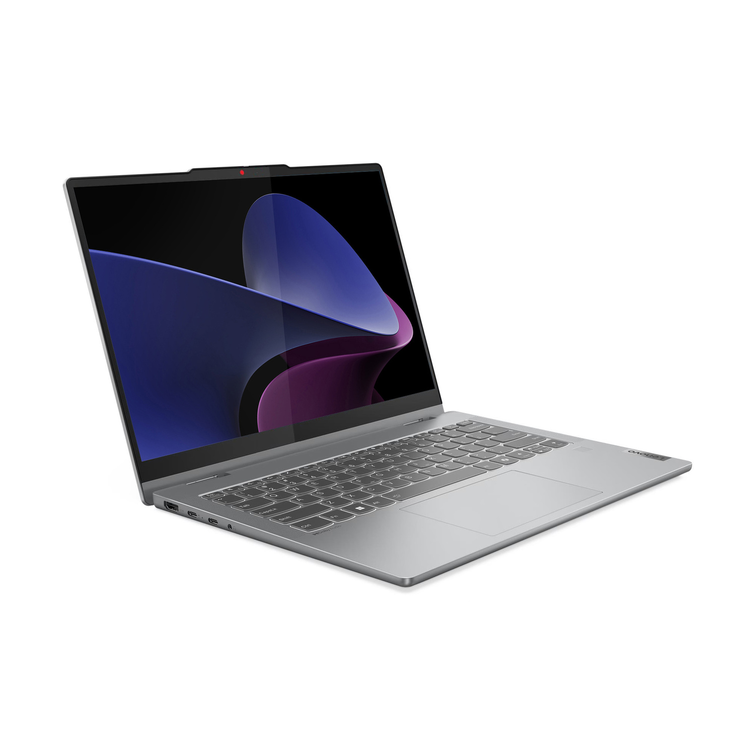 Un computer portatile argentato con tastiera nera e sfondo dello schermo blu e viola su sfondo bianco.
