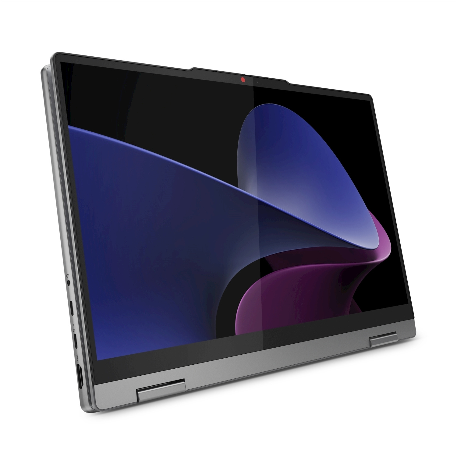 Un computer portatile grigio mostra uno sfondo astratto blu e viola sullo schermo lucido.
